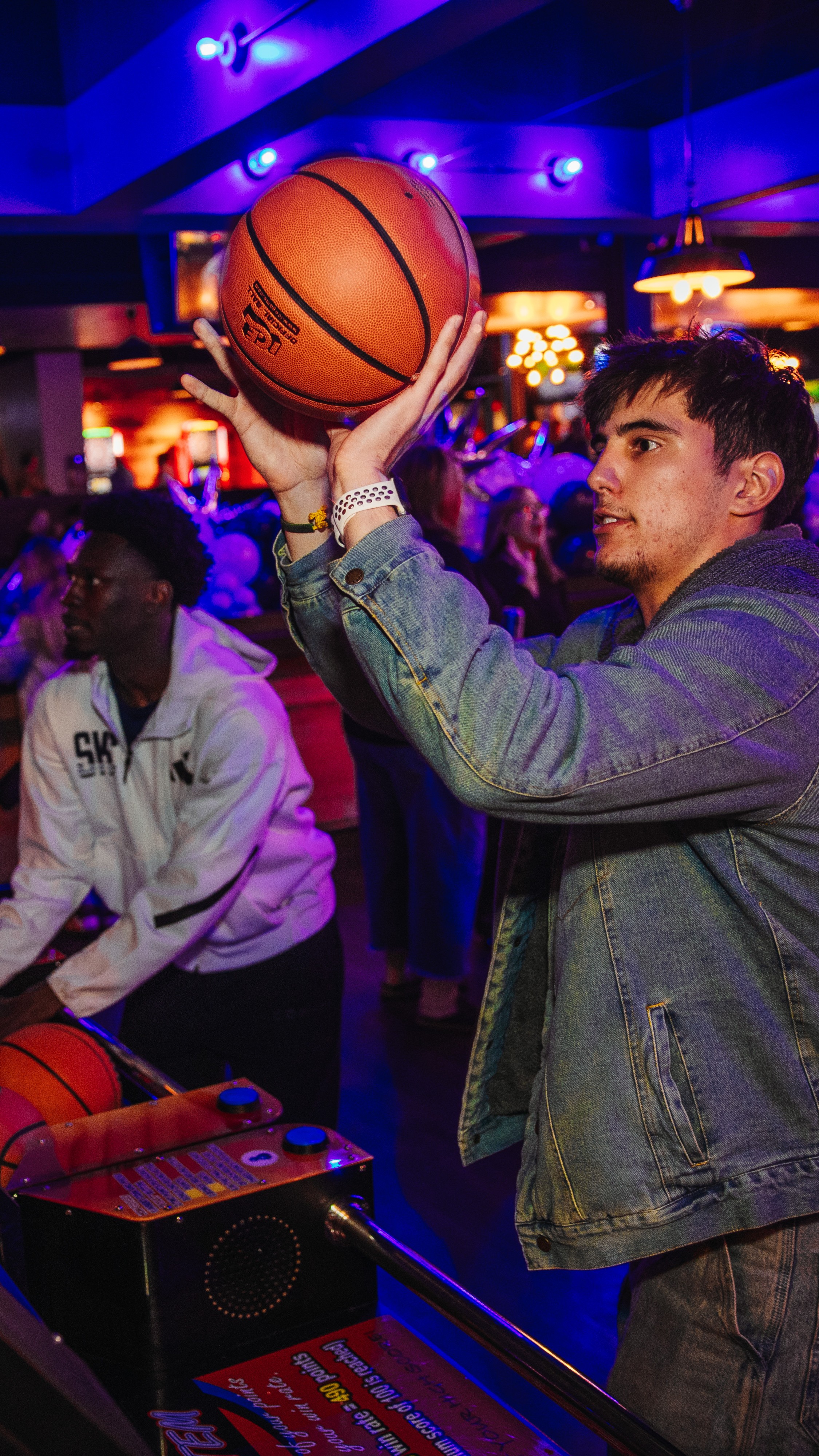 Man playing Pop-a-Shot