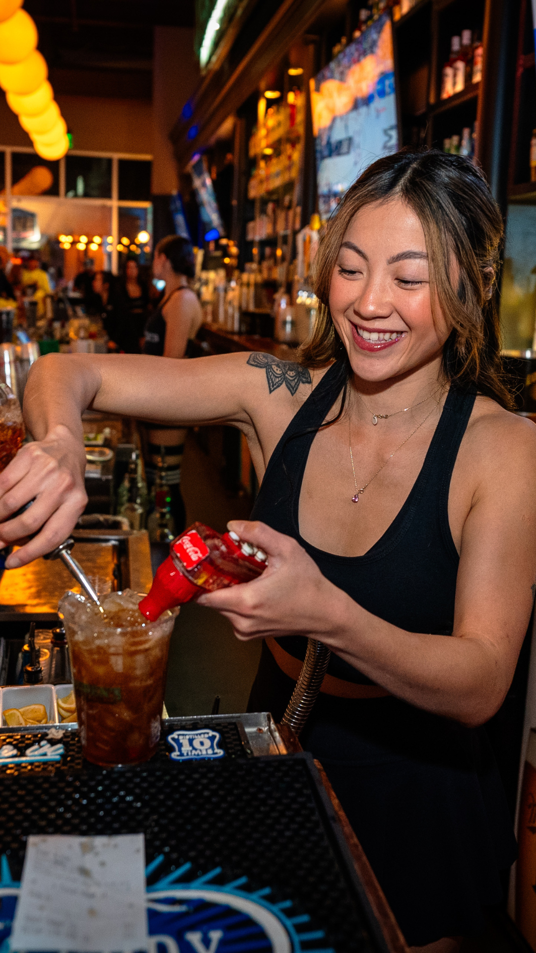 Bartender pouring a drink