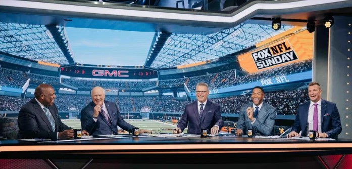 The cast of FOX NFL Sunday on set.