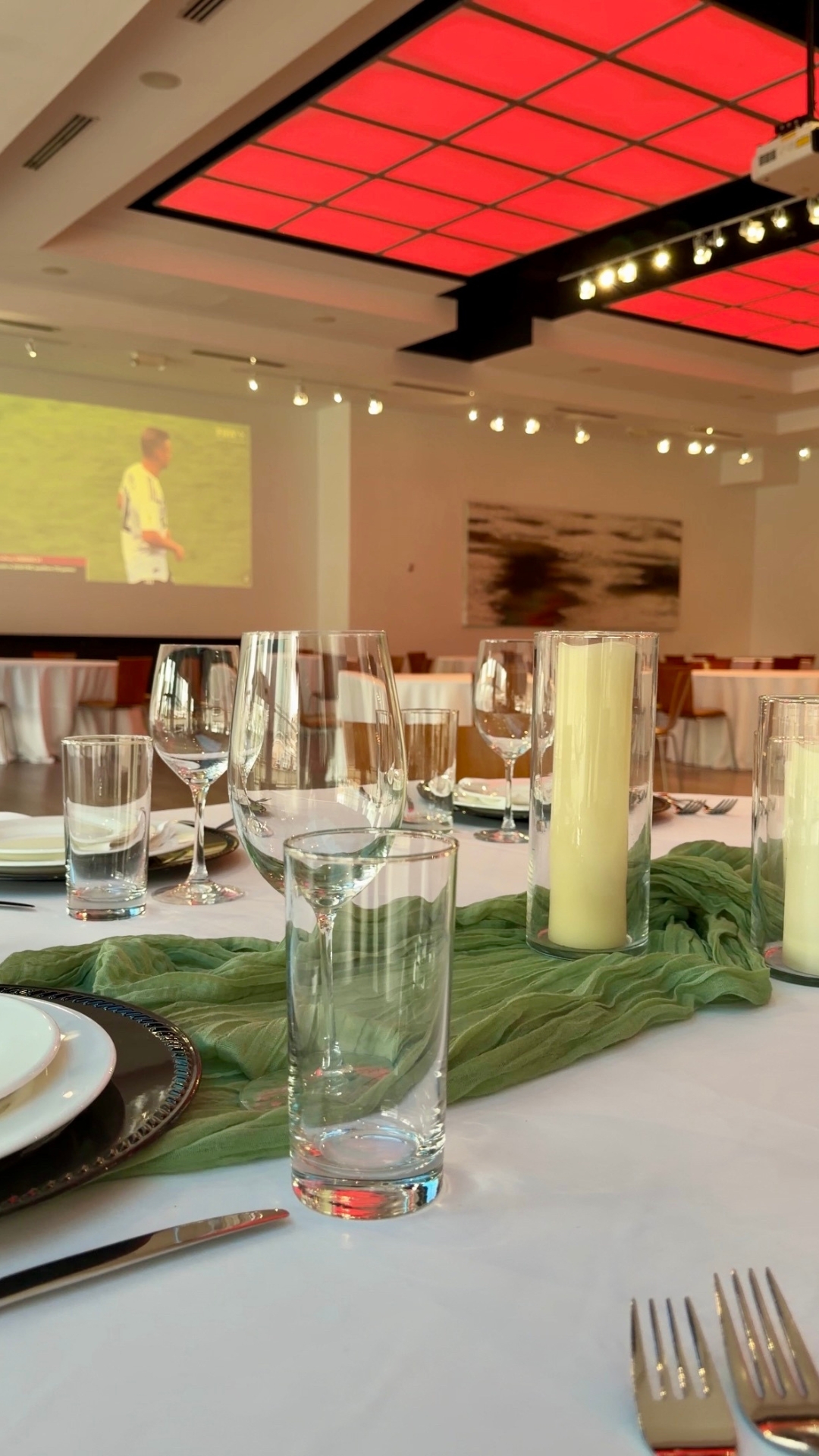 The Gallery Event Space set for Soccer in the City with a soccer match on the HD wall projector.