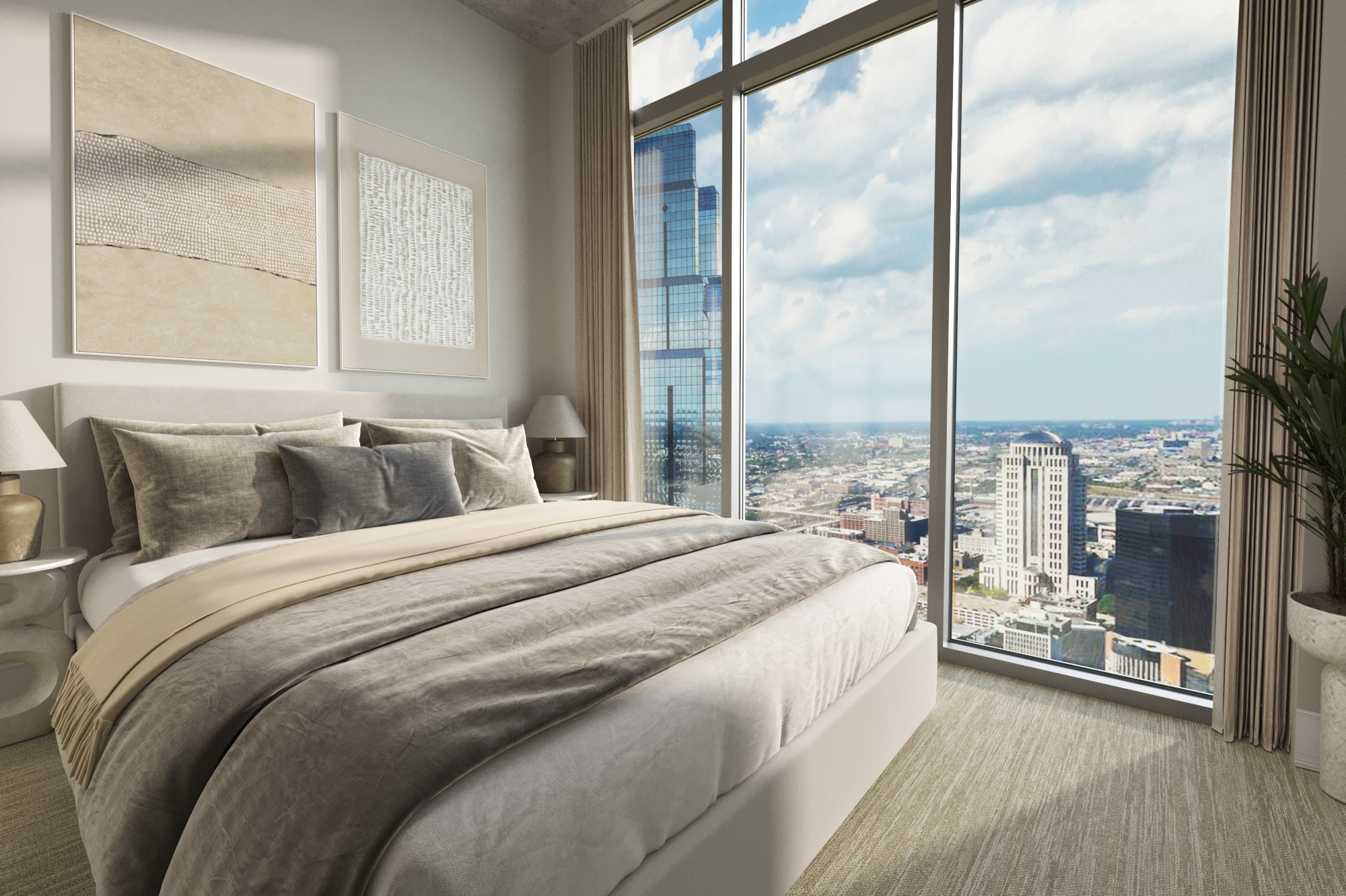 City view from bedroom with floor-to-ceiling windows at One Light luxury apartment in Kansas City, MO.