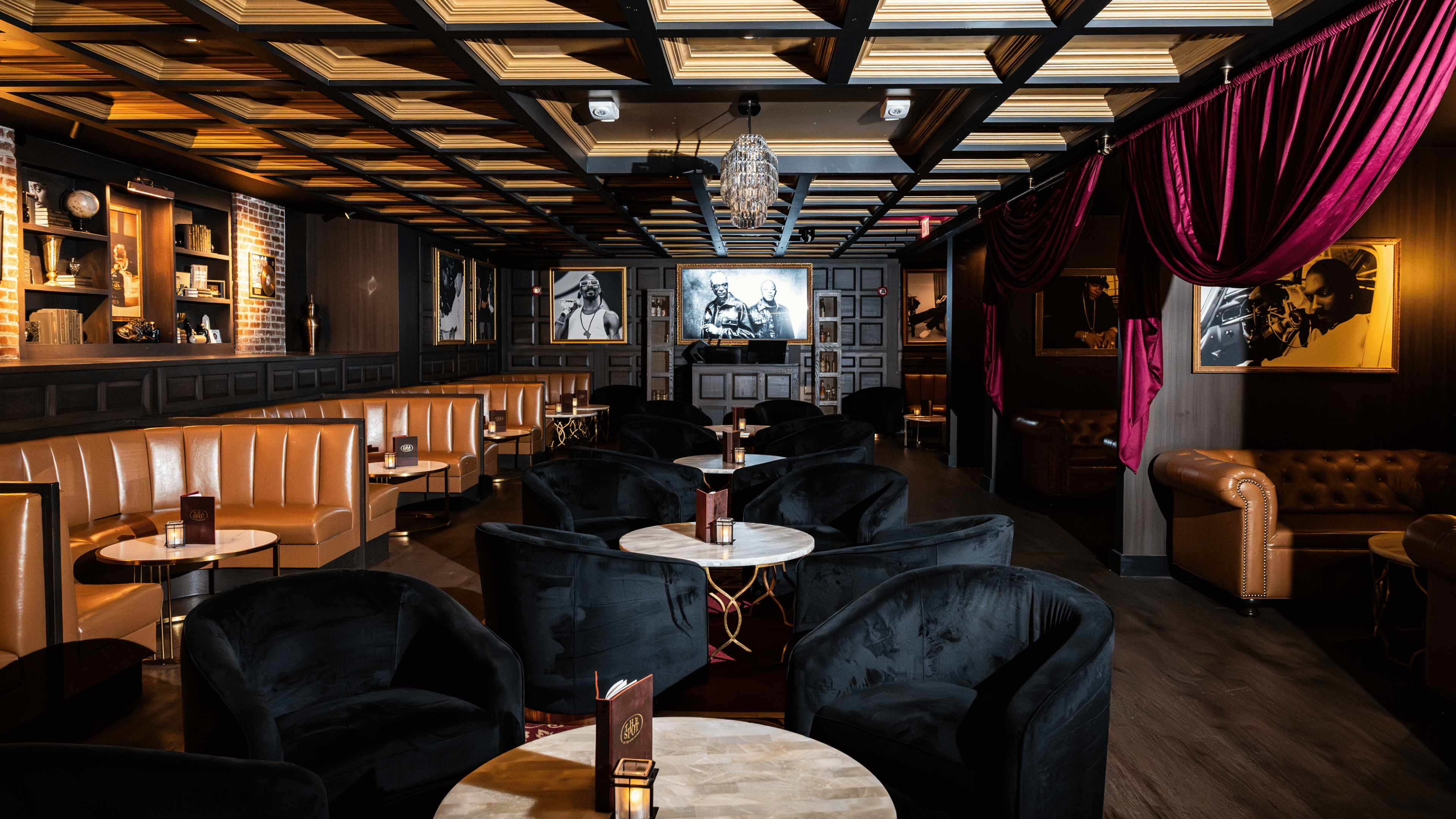 Full venue photo, including bar, booths, and tables, of The Spot By Dre and Snoop at Nashville Live!