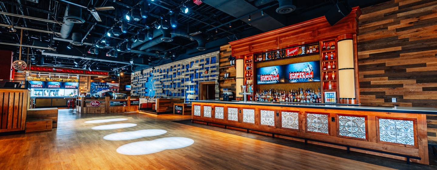 PBR Cowboy Bar full bar, dance floor, and mechanical bull at Live! at the Pointe Orlando.