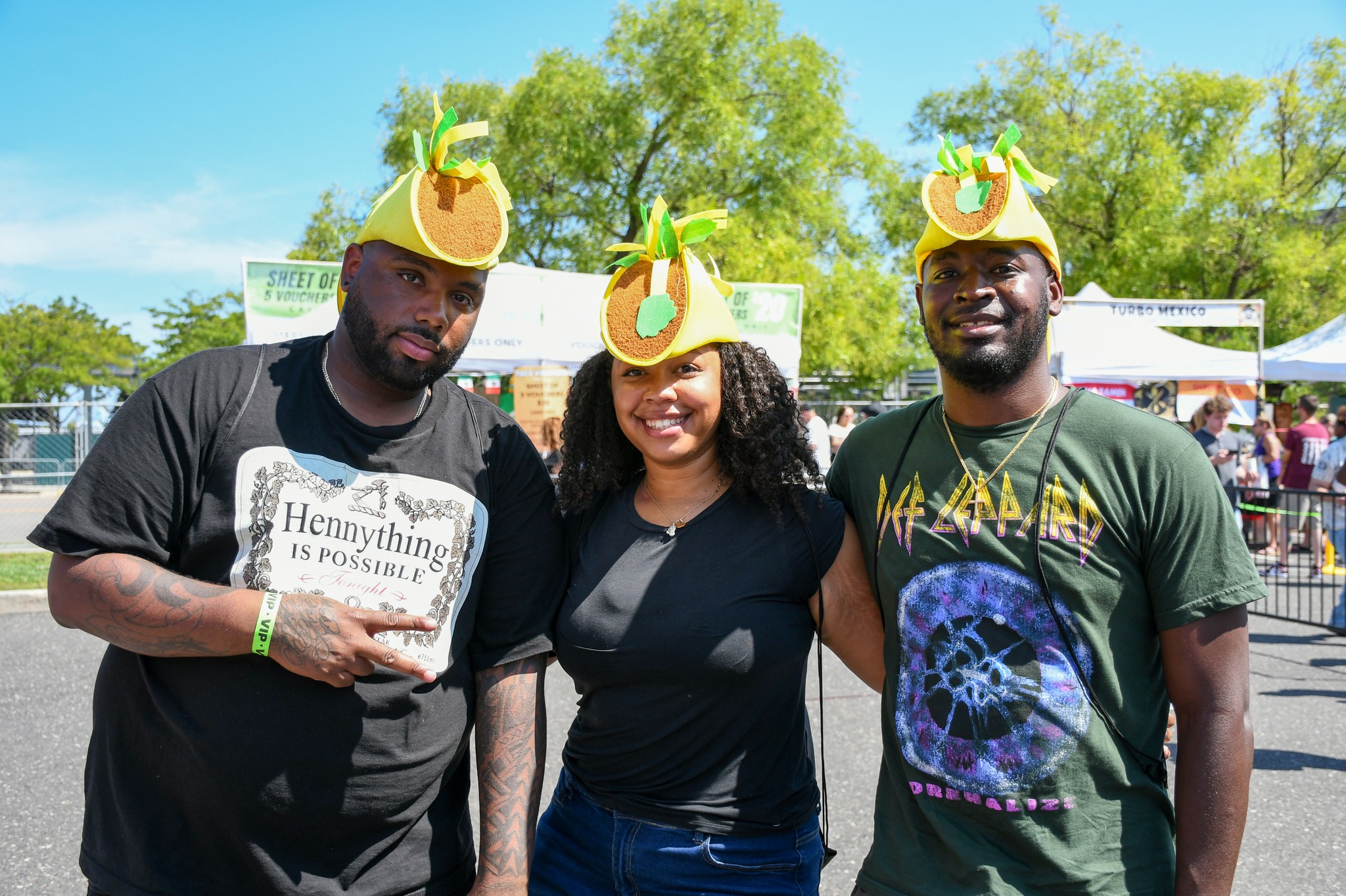 Two men and a woman at Taco Fest.