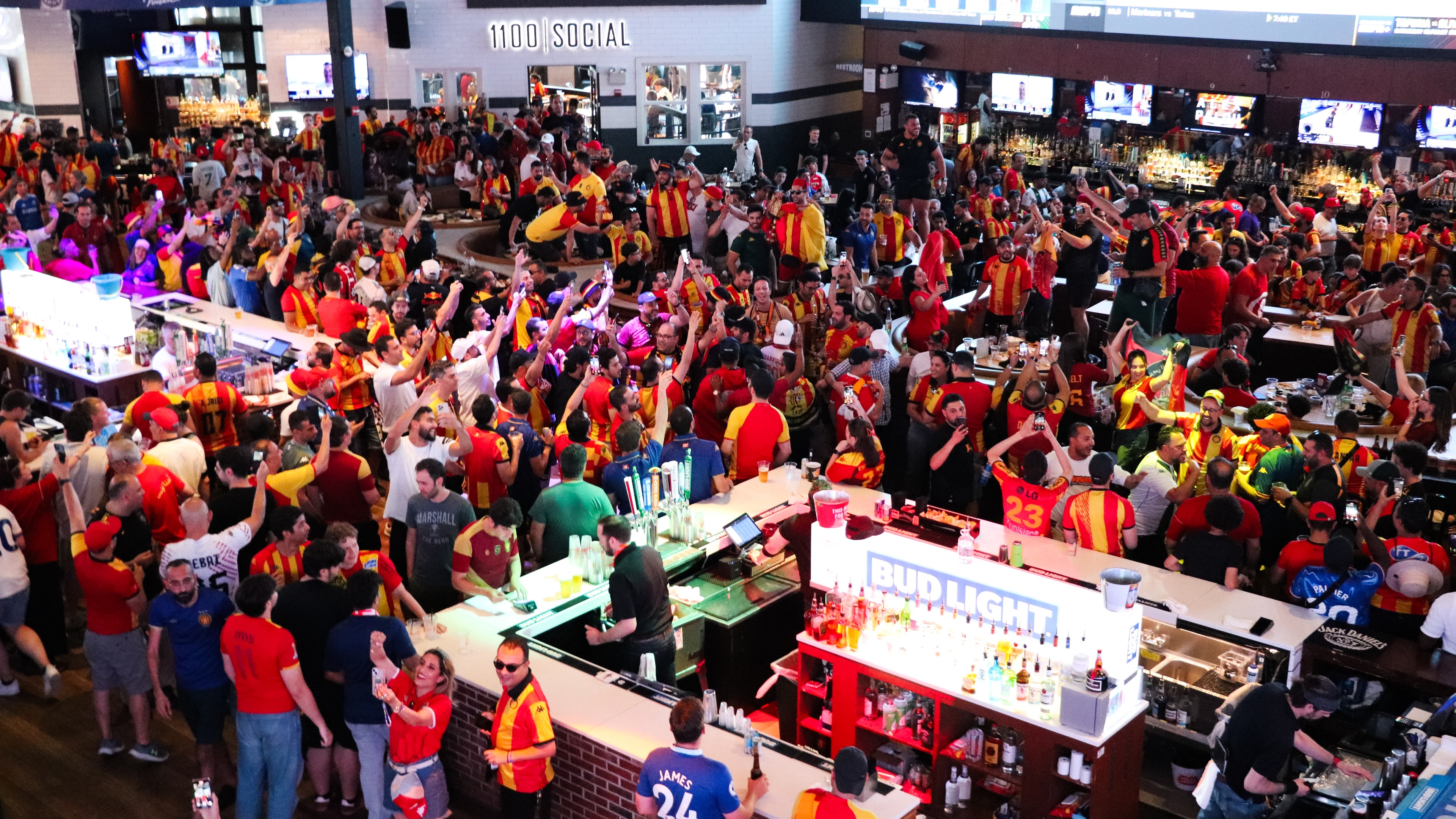 Guests fill Live! Arena at Stateside Live! for soccer watch party.