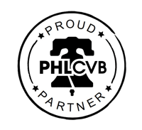 Proud PHLCVB Partner black stacked text circular logo with Liberty Bell and graphic in the background.