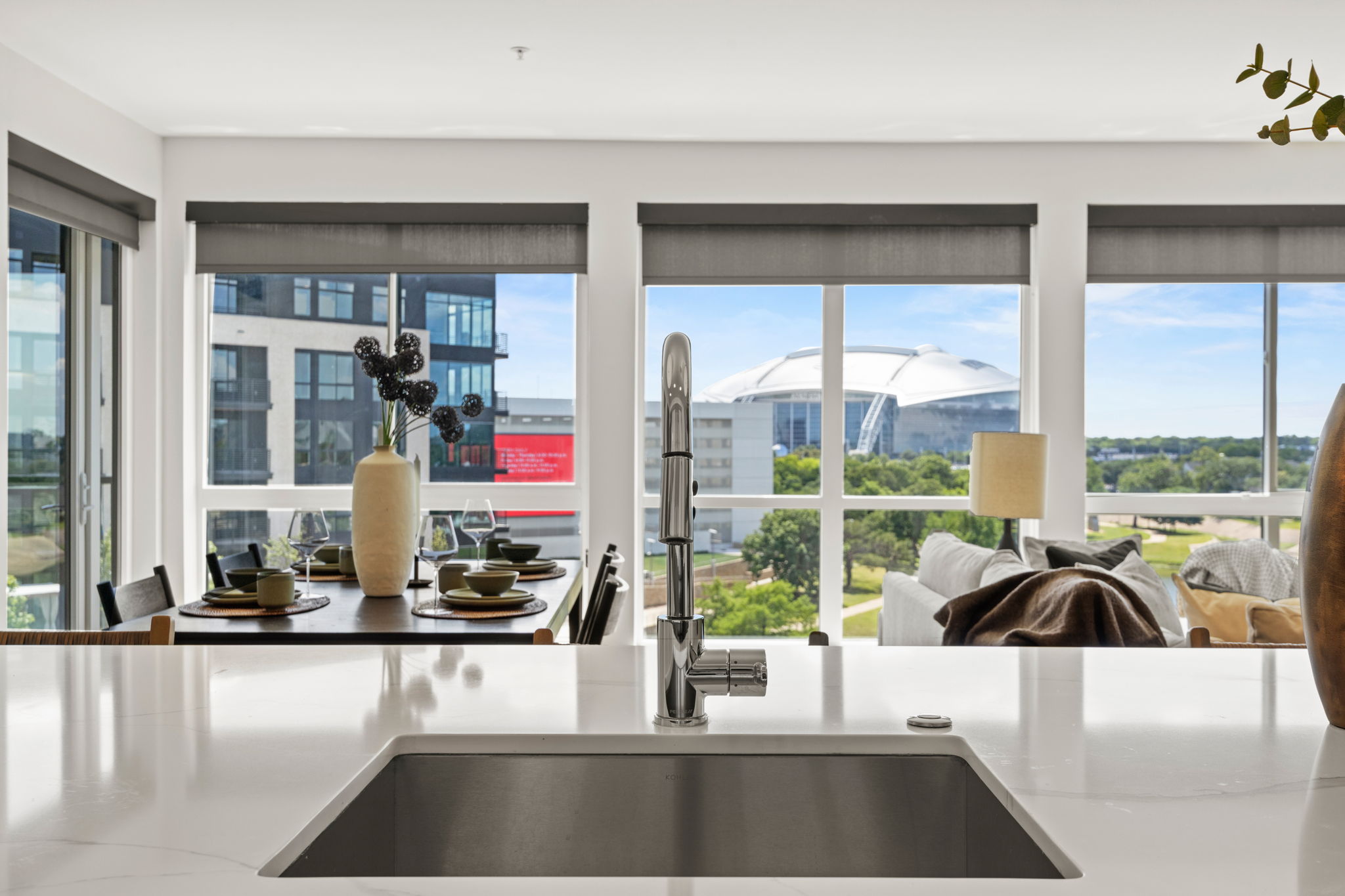 Panoramic view of a kitchen and dining table at One Rangers Way