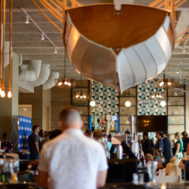 Group celebrating in The Harbor Club.