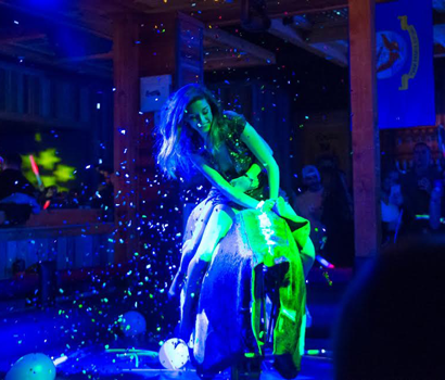 Girl riding mechanical bull