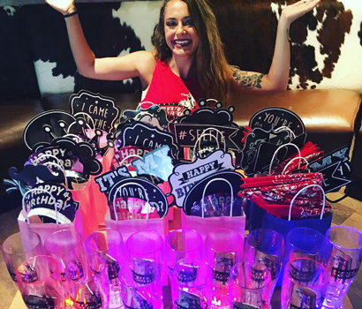 Girl showing off gift bags