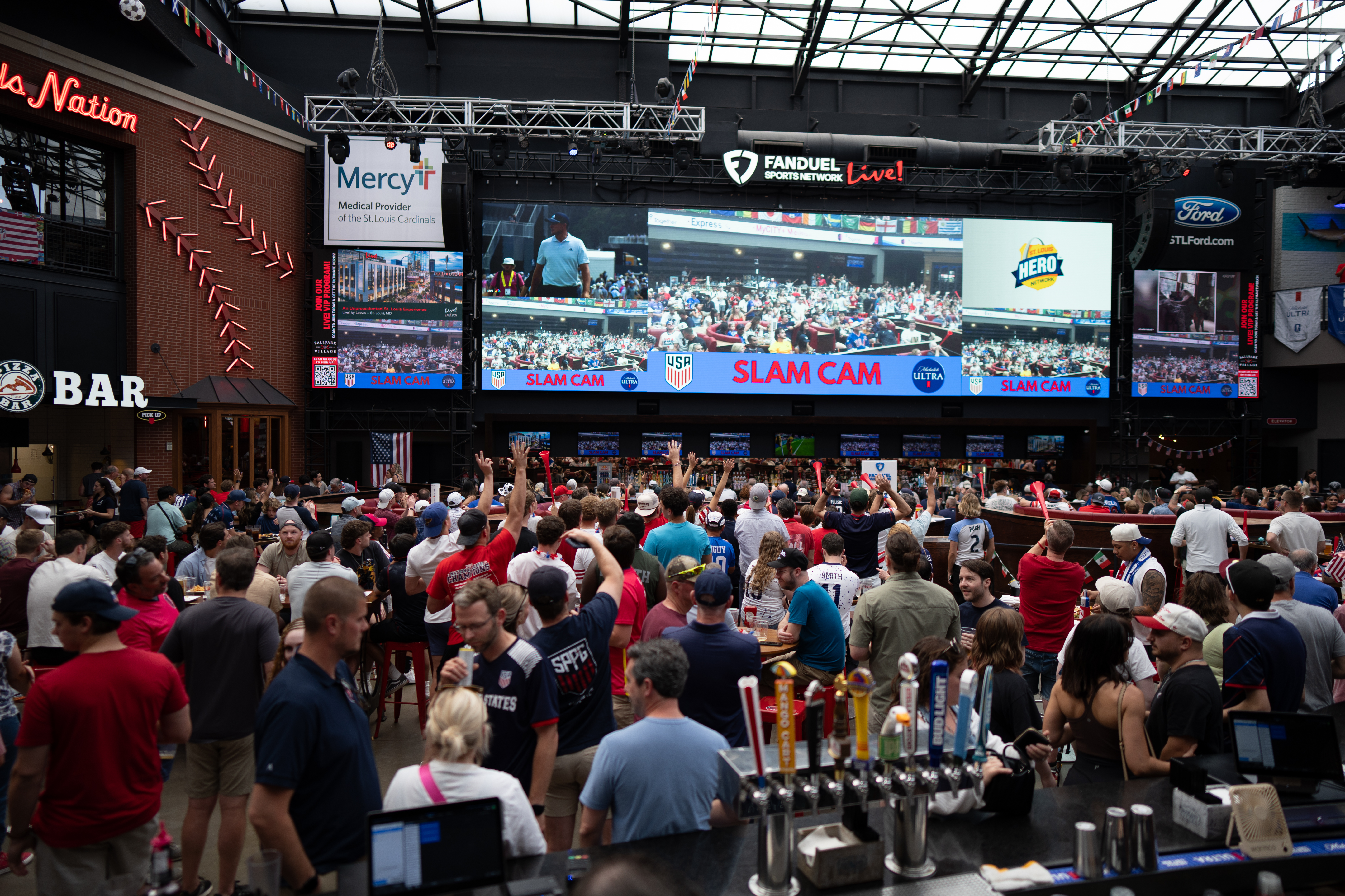 Live Arena big screen with crowd