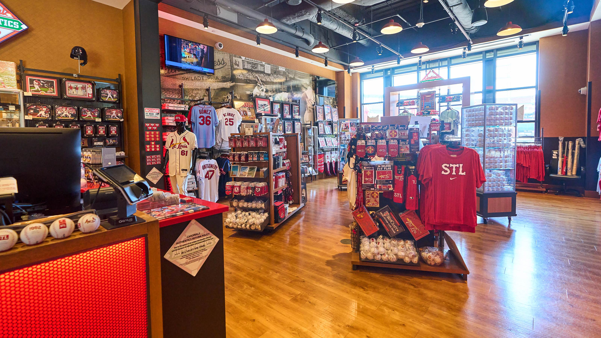 Inside of Cardinal Authentics store at Ballpark Village, items include jerseys, hats, apparel, gifts, memorabilia, and more.