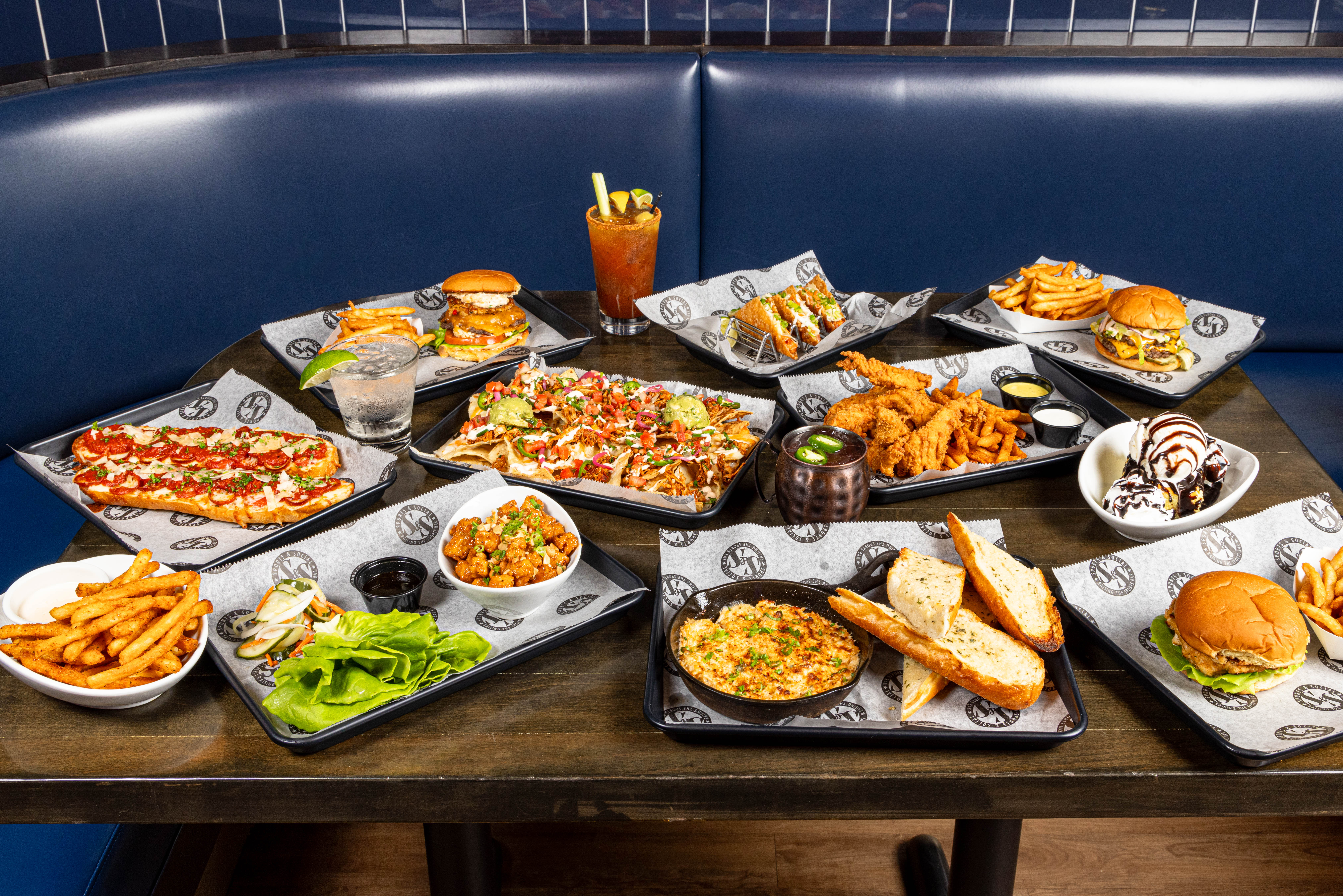 An outlay of a bunch of dishes from Sports and Social.
