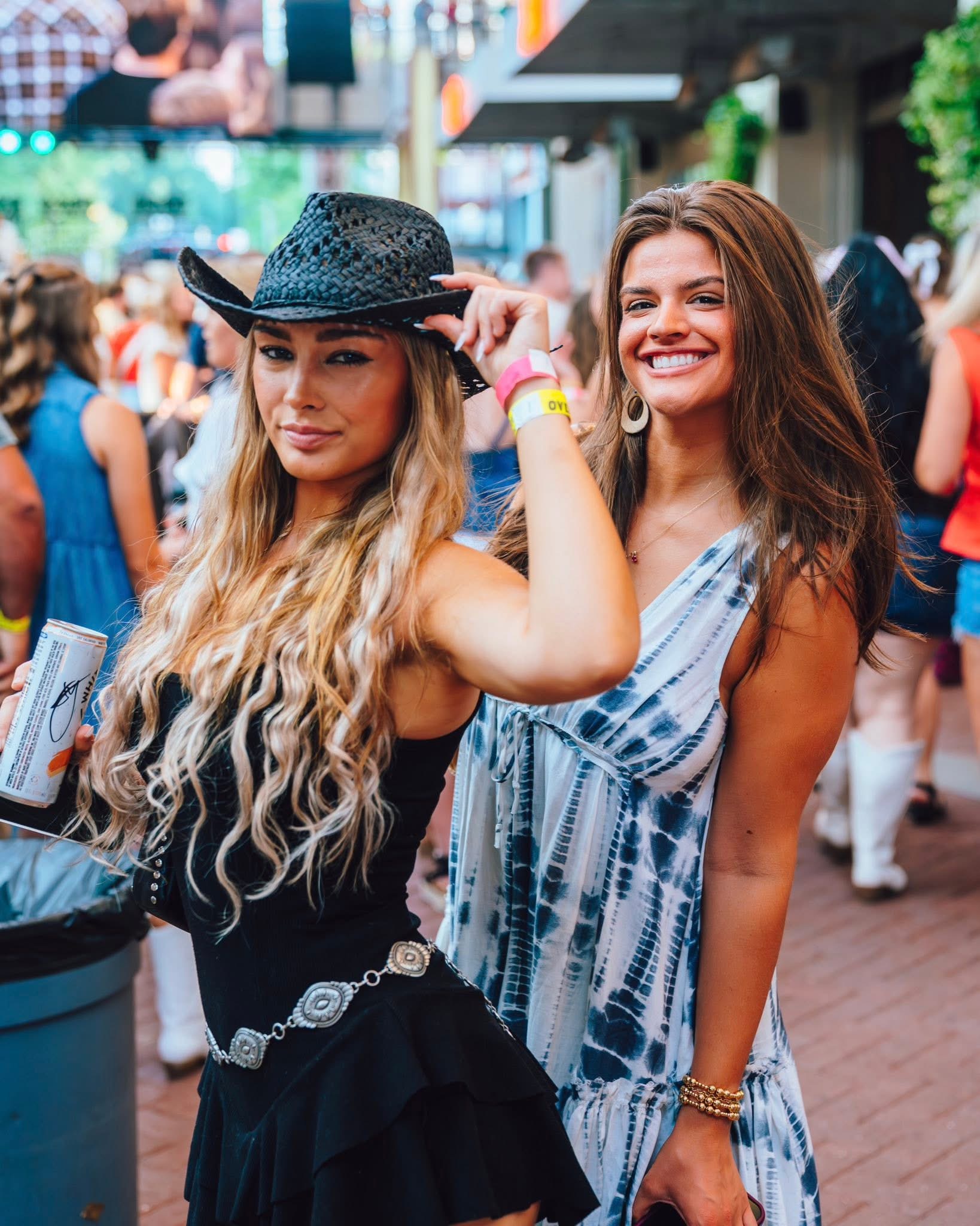 An image of two girls at the FSL Ty Myer's concert.