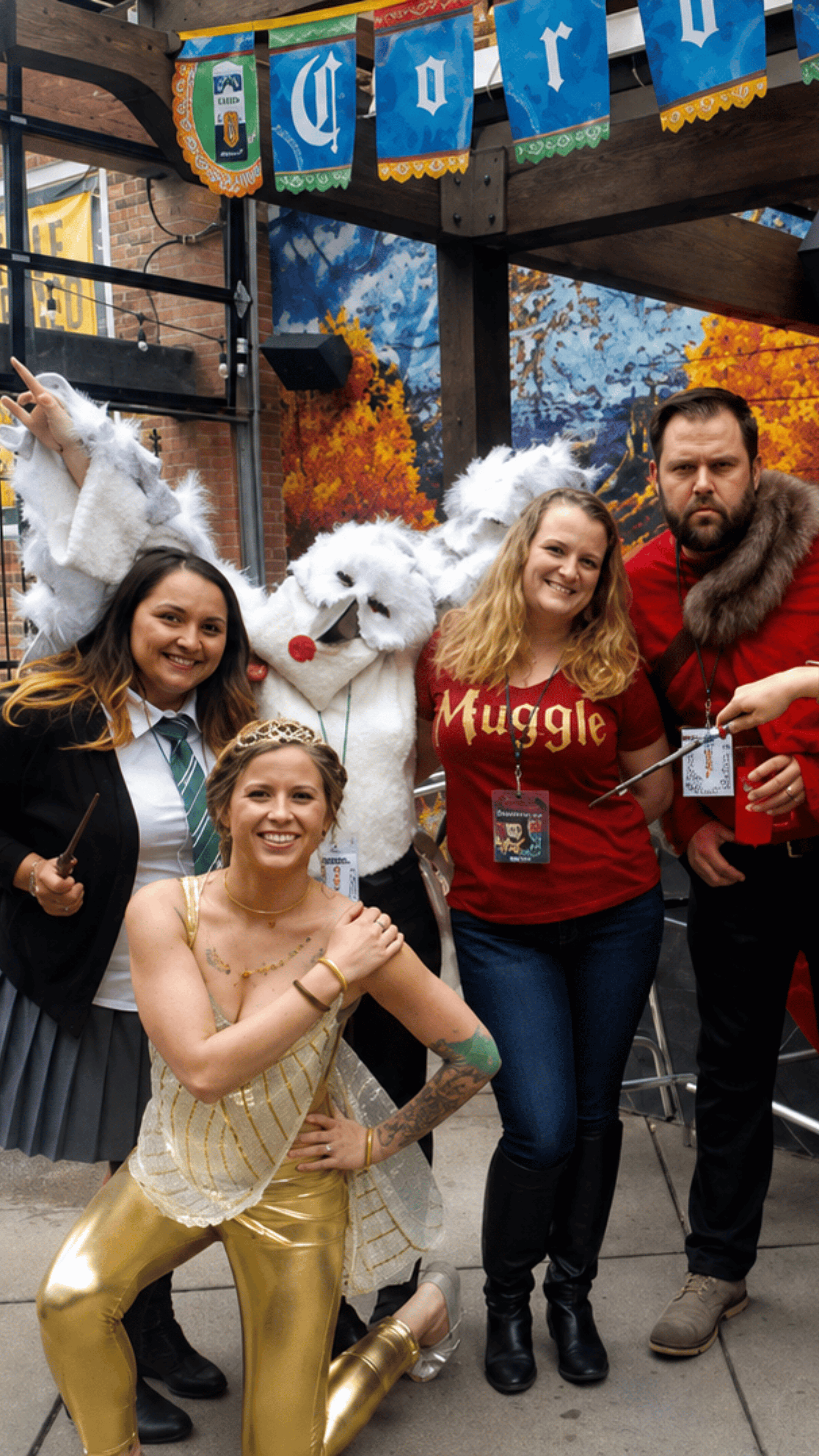 An image of five people in Harry Potter clothing and costumes.