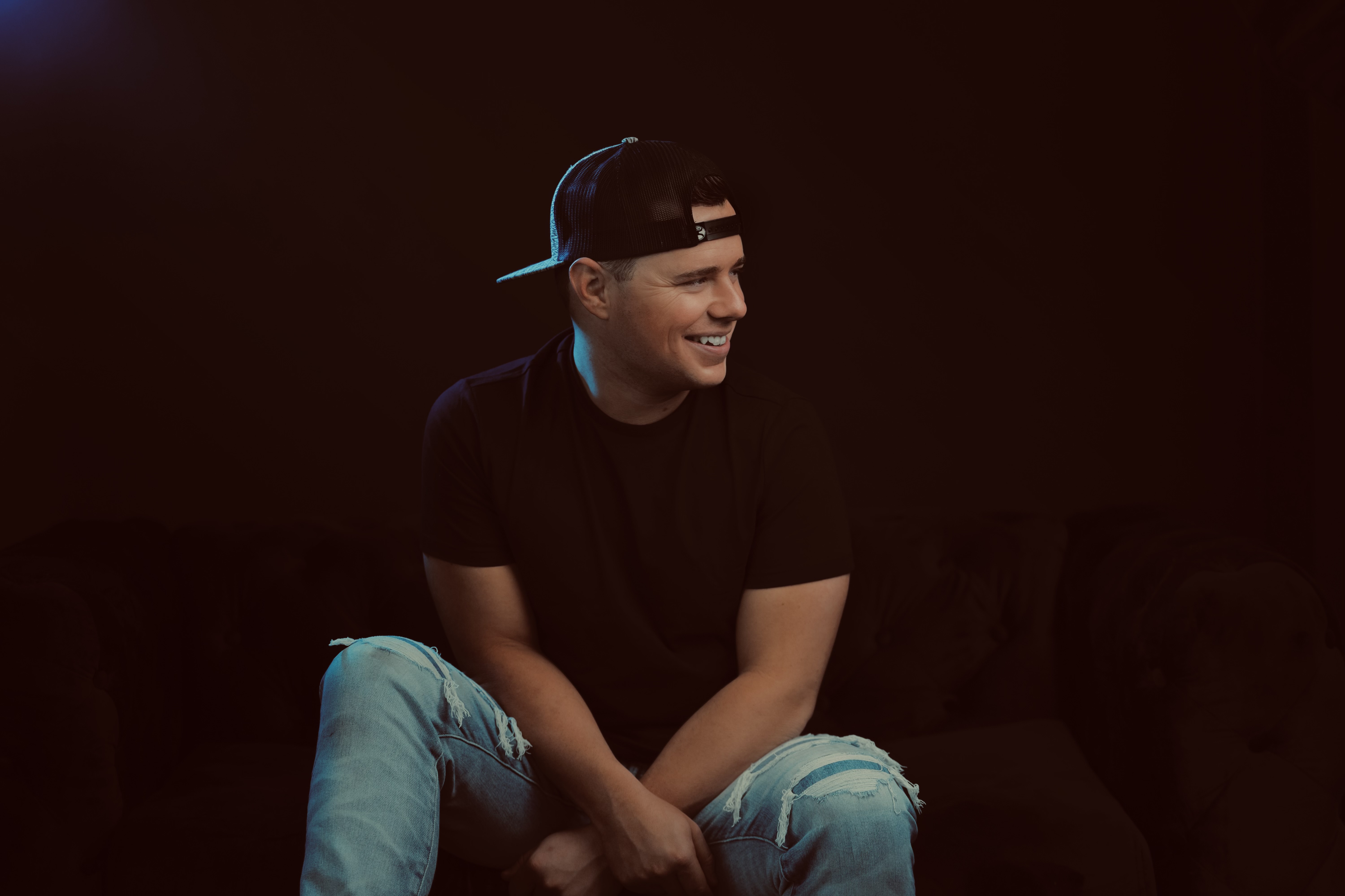 An image of a man, Kevin jaggers, posing for a picture and looking to the side.
