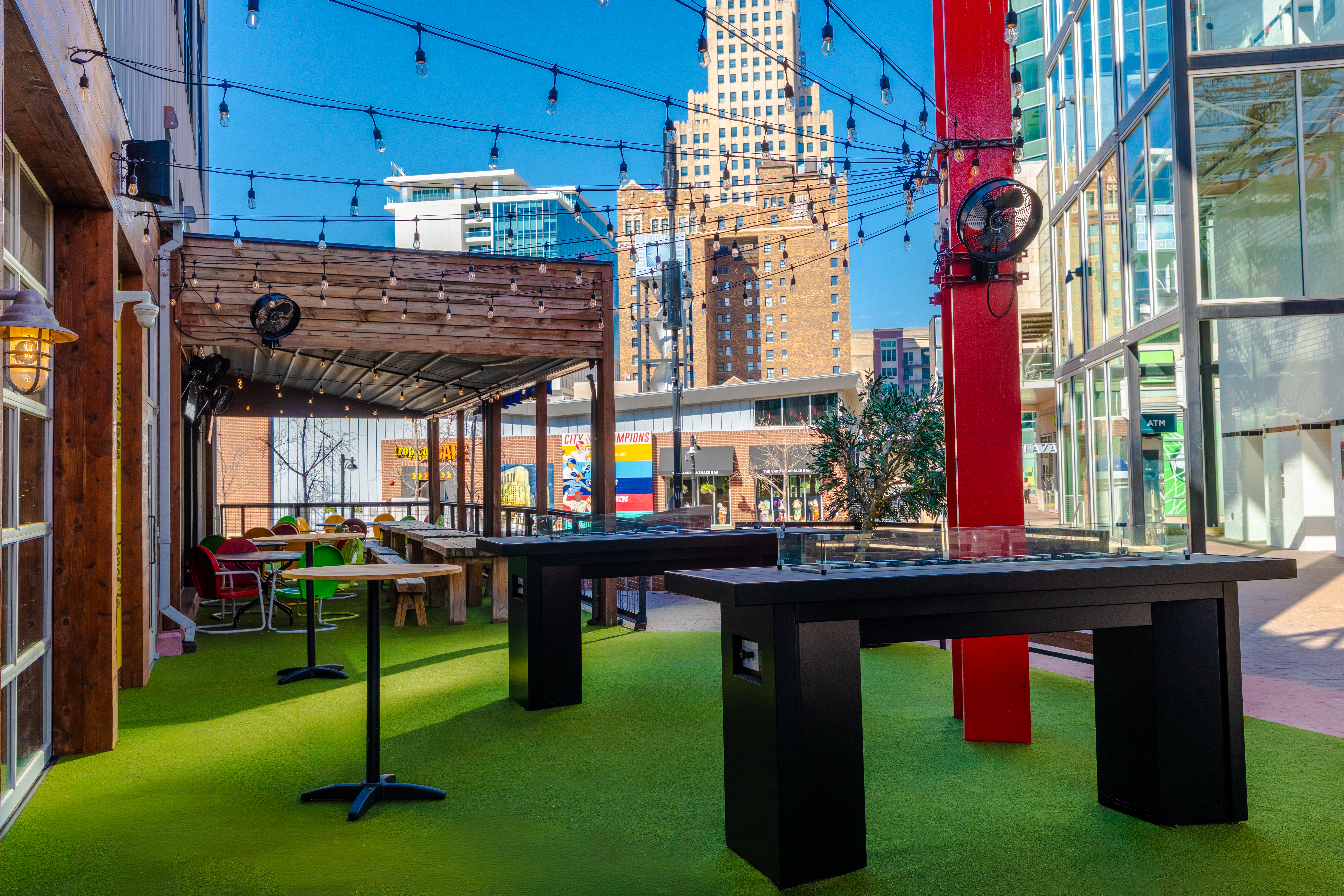 Outdoor patio of County Road with heated tables and patio chairs.
