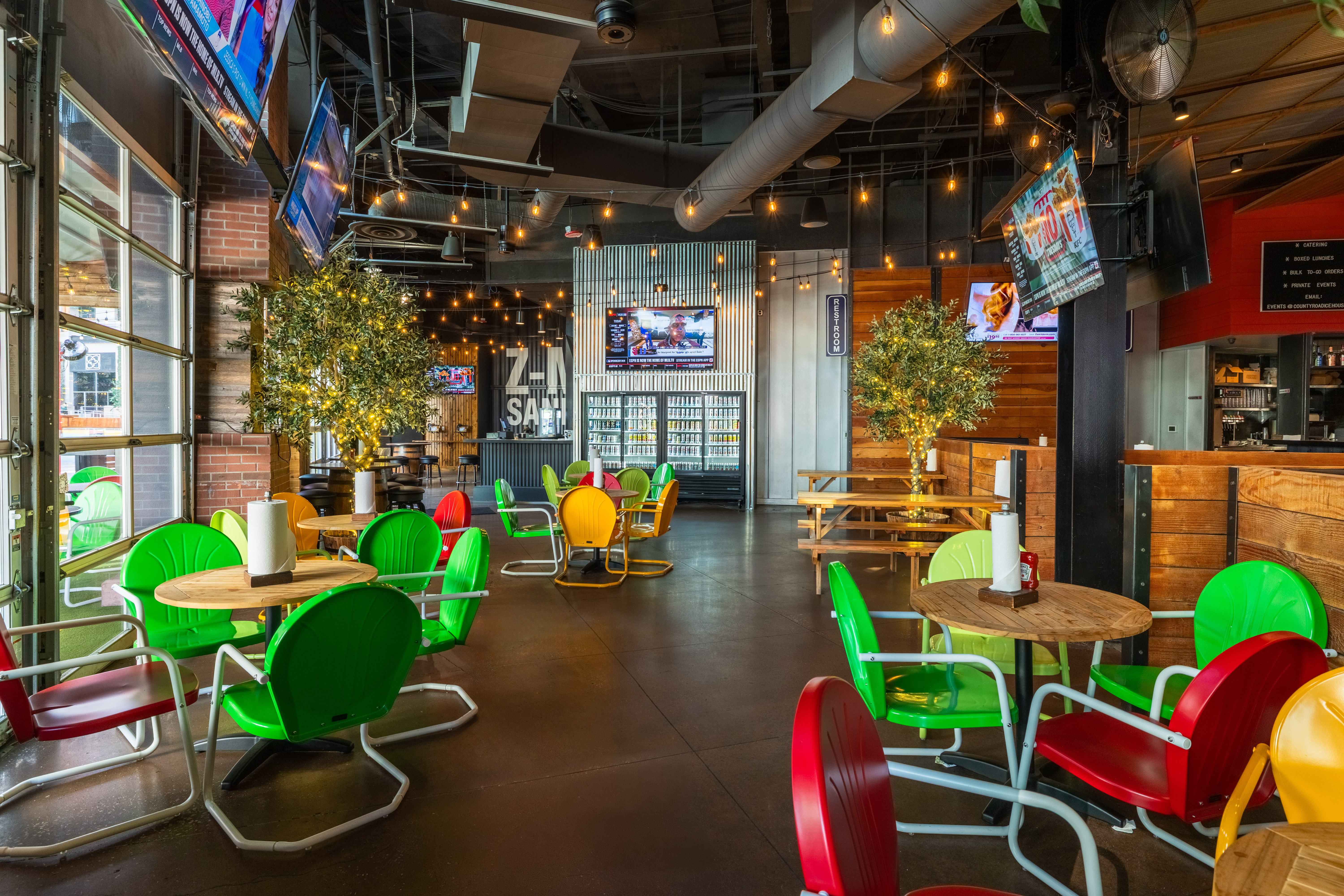 Interior of County Road Ice House with colorful chairs