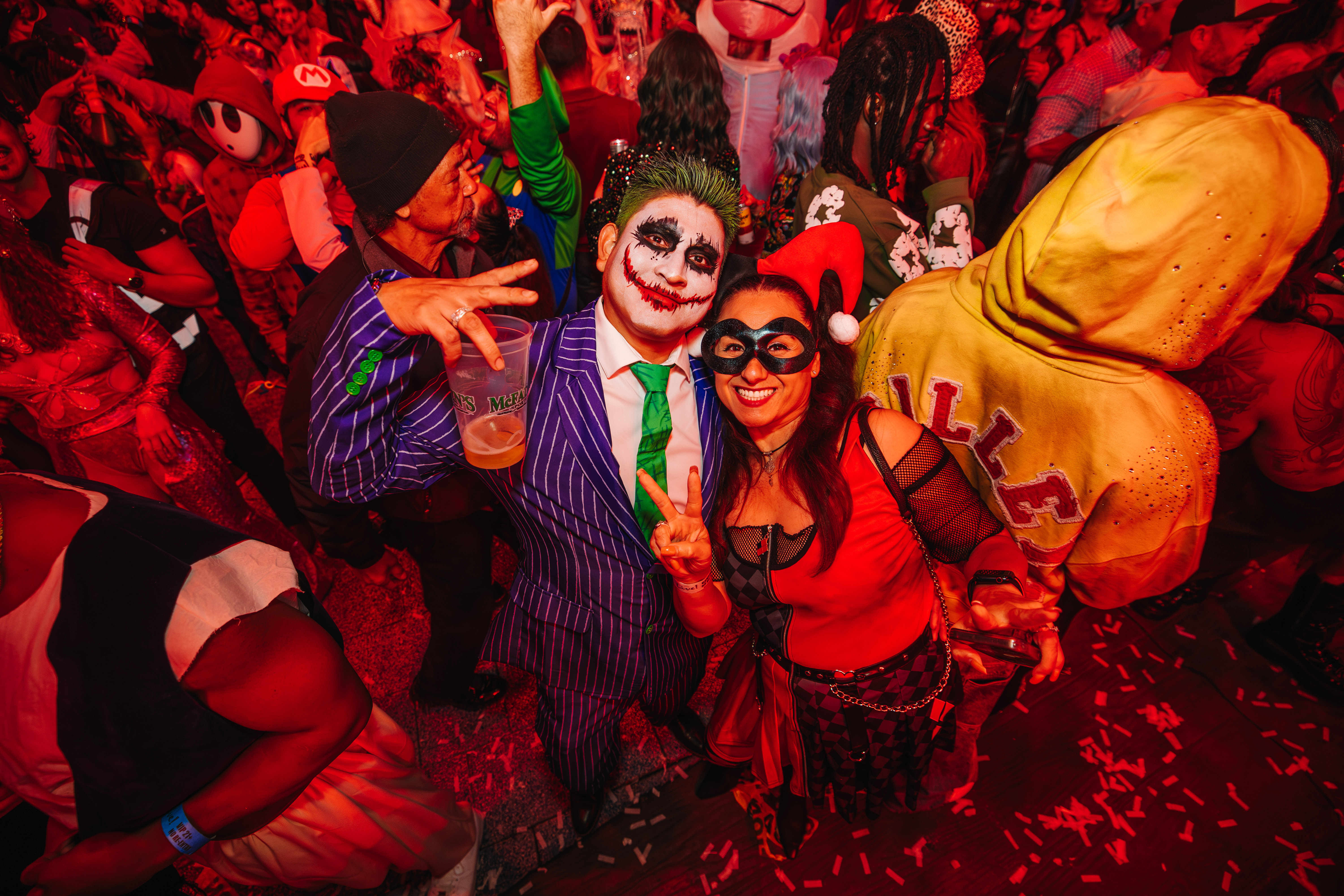 Couple dressed as the Joker and Harley Quinn