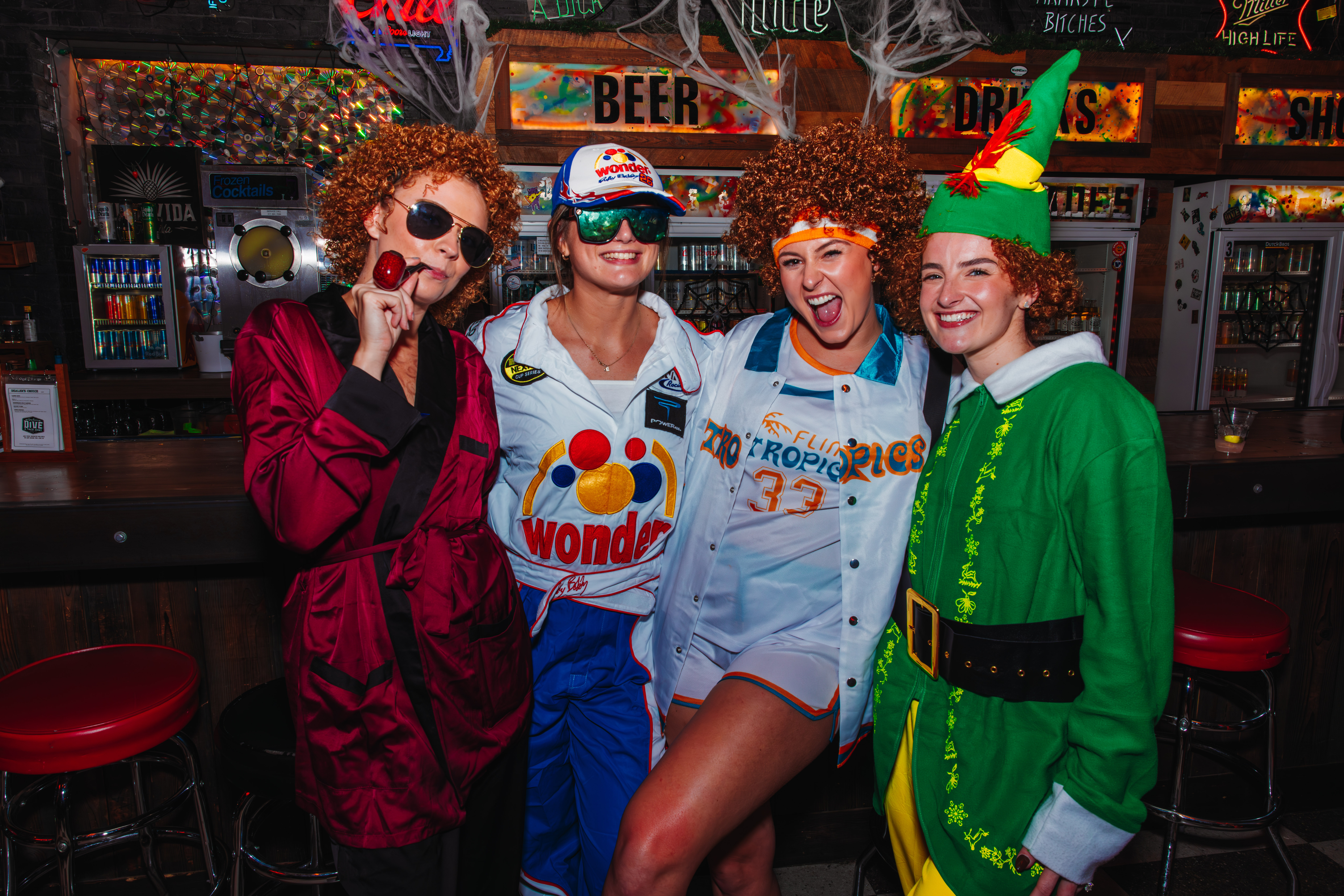 Guests at Guy Fieri's Dive and Taco Joint dressed in various Halloween costumes