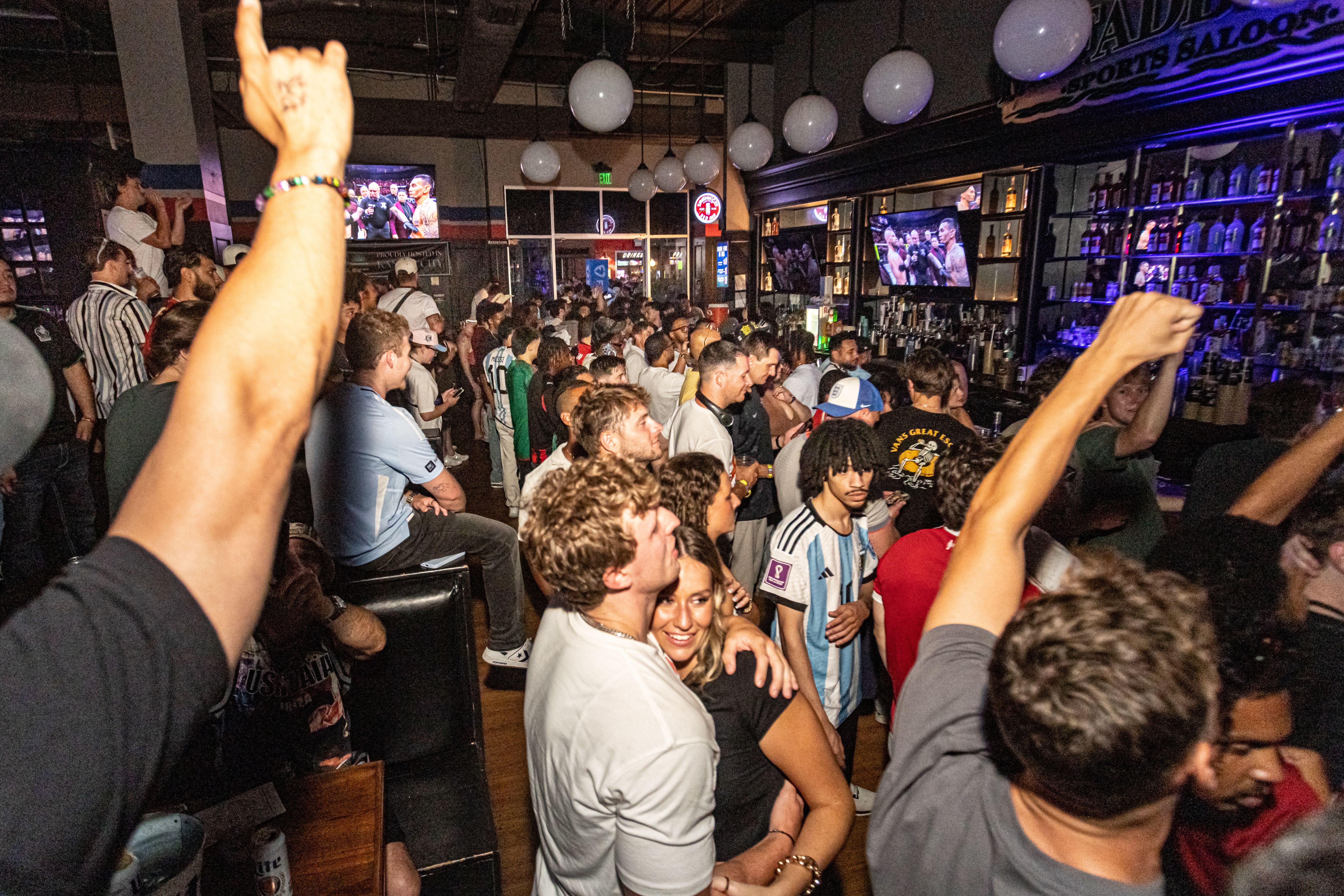 Crowd watching UFC fight at McFadden's