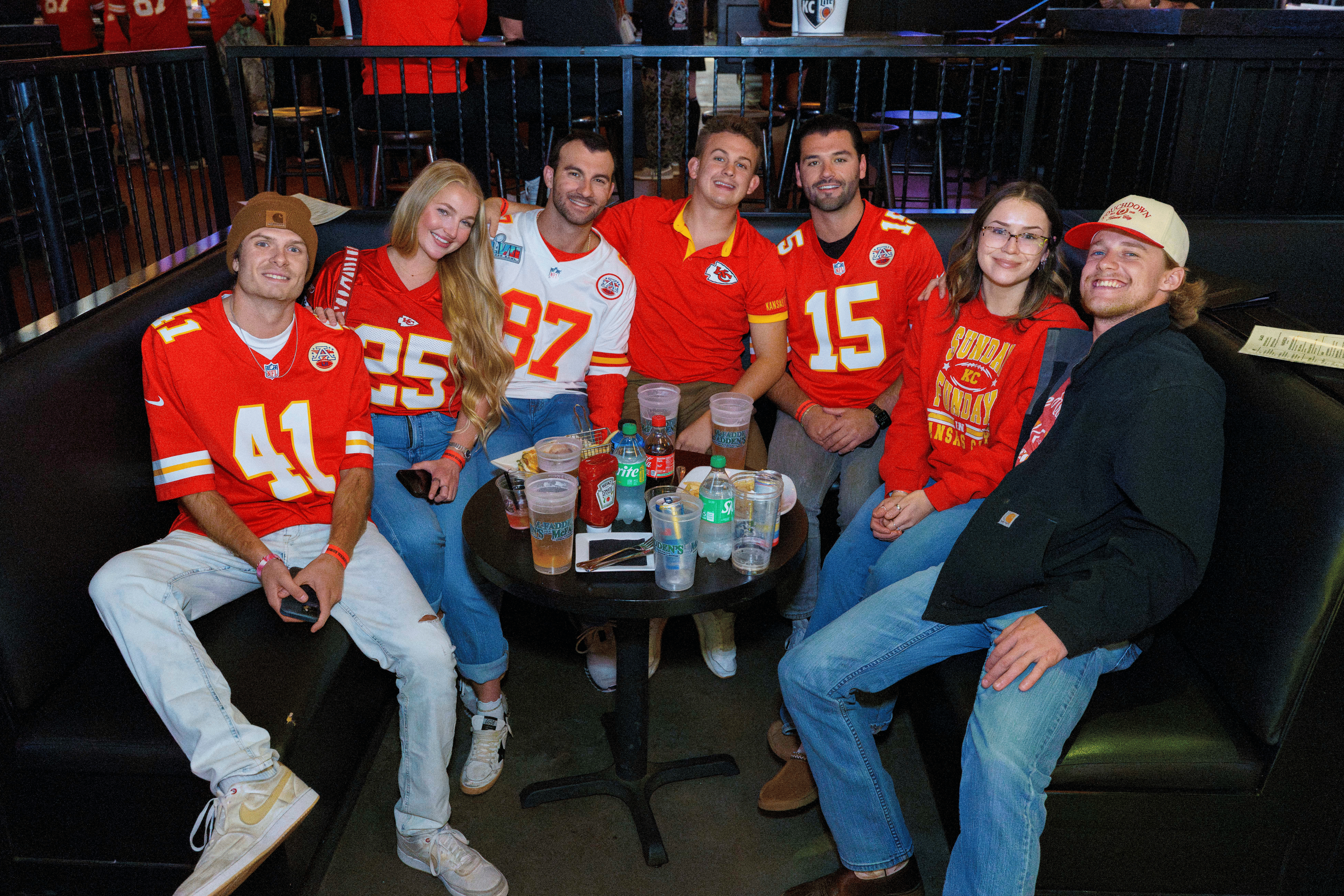 Group of Chiefs fans in a booth at McFadden's