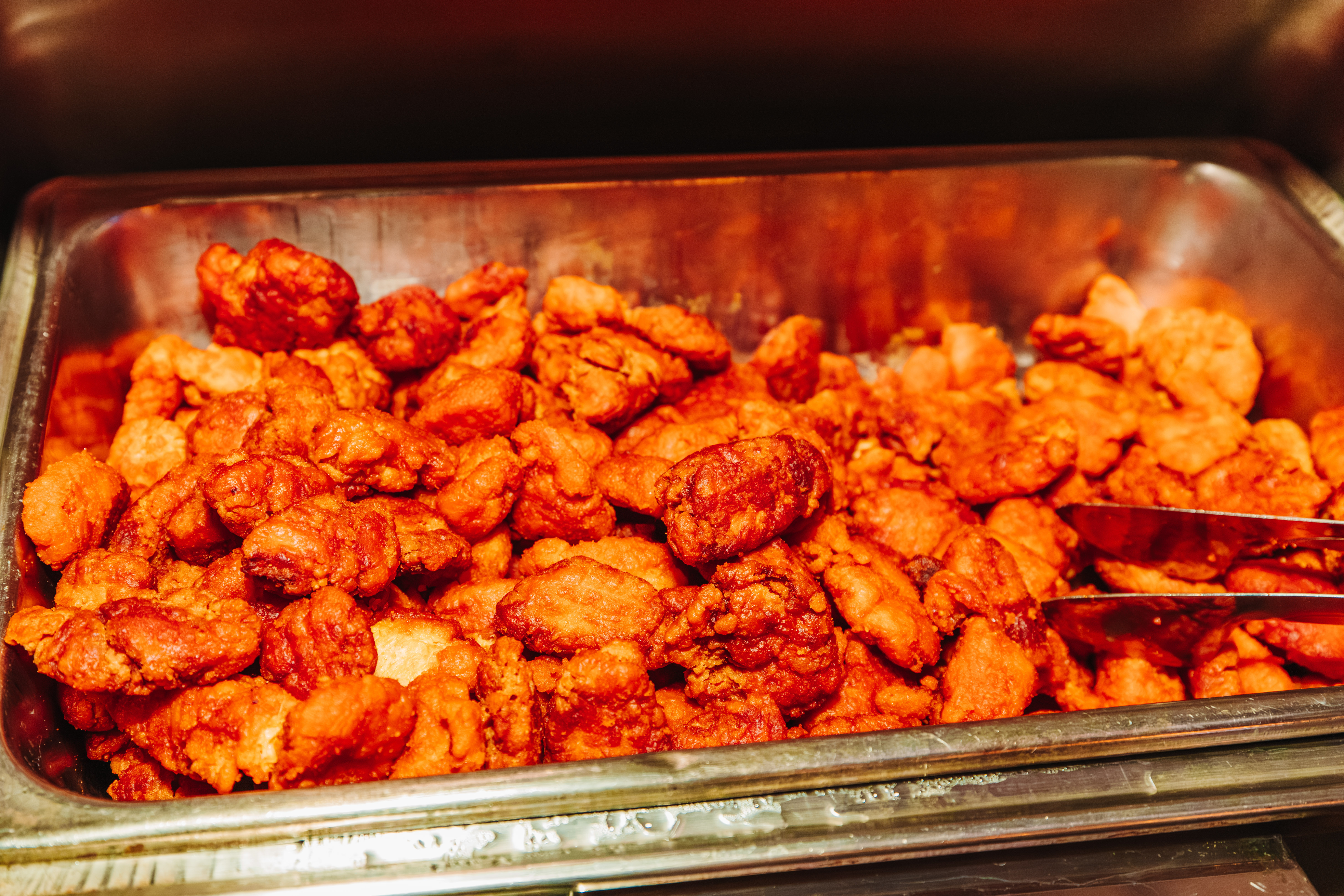 Metal tray full of buffalo wings