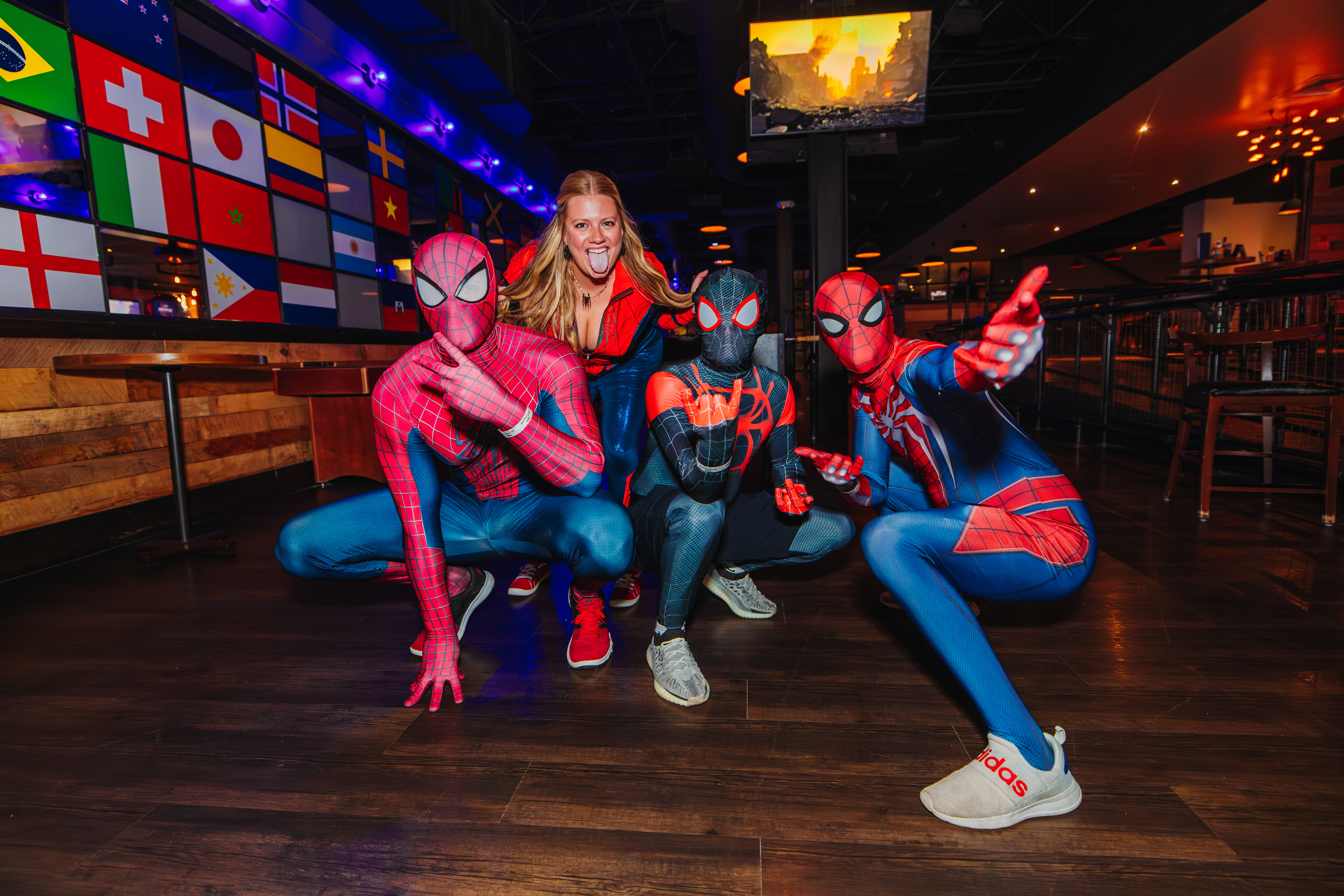 Guests in Spiderman costumes at No Other Pub