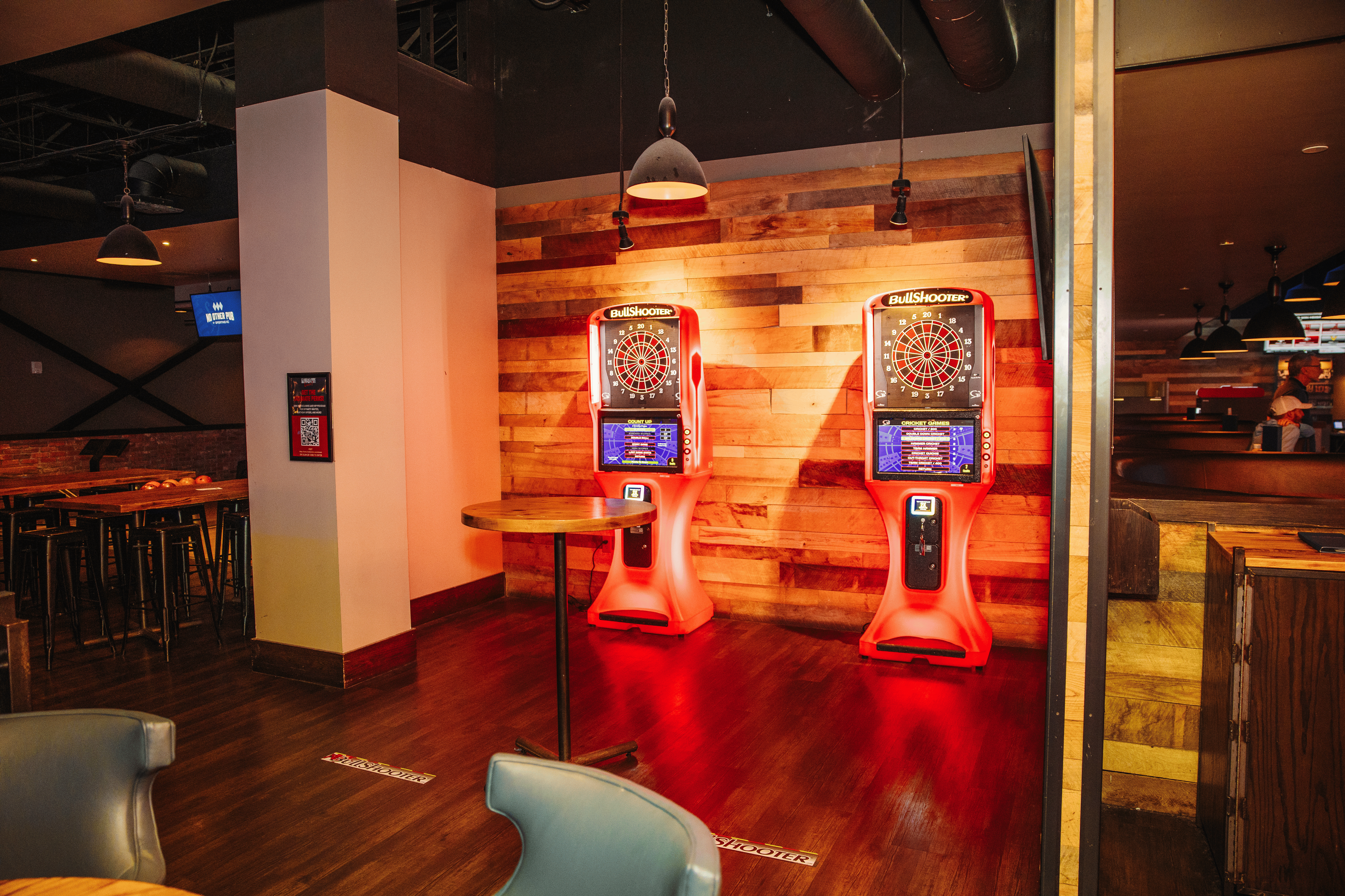 Two arcade dart machines at No Other Pub