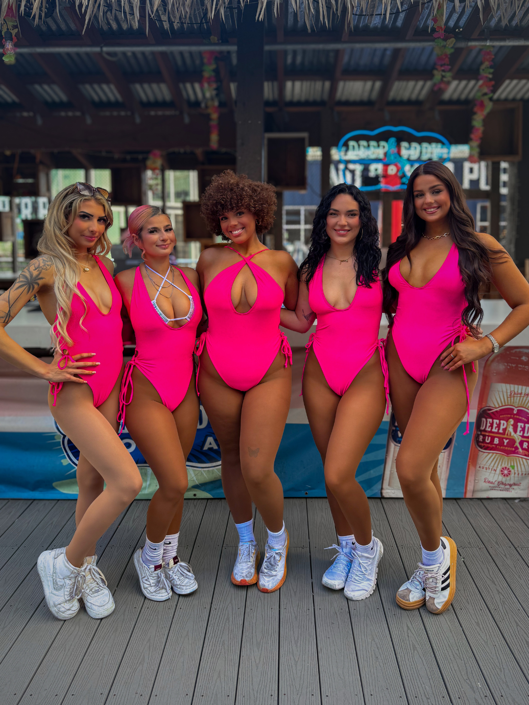 Sharkies in their signature pink swim uniforms