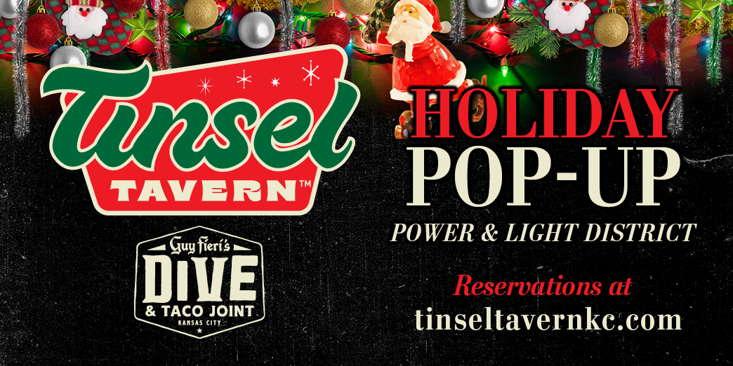 Tinsel Tavern Holiday Pop-Up bar Power& Light District reservations at tinseltavernkc.com Christmas lights and ornaments bordering the top with black background