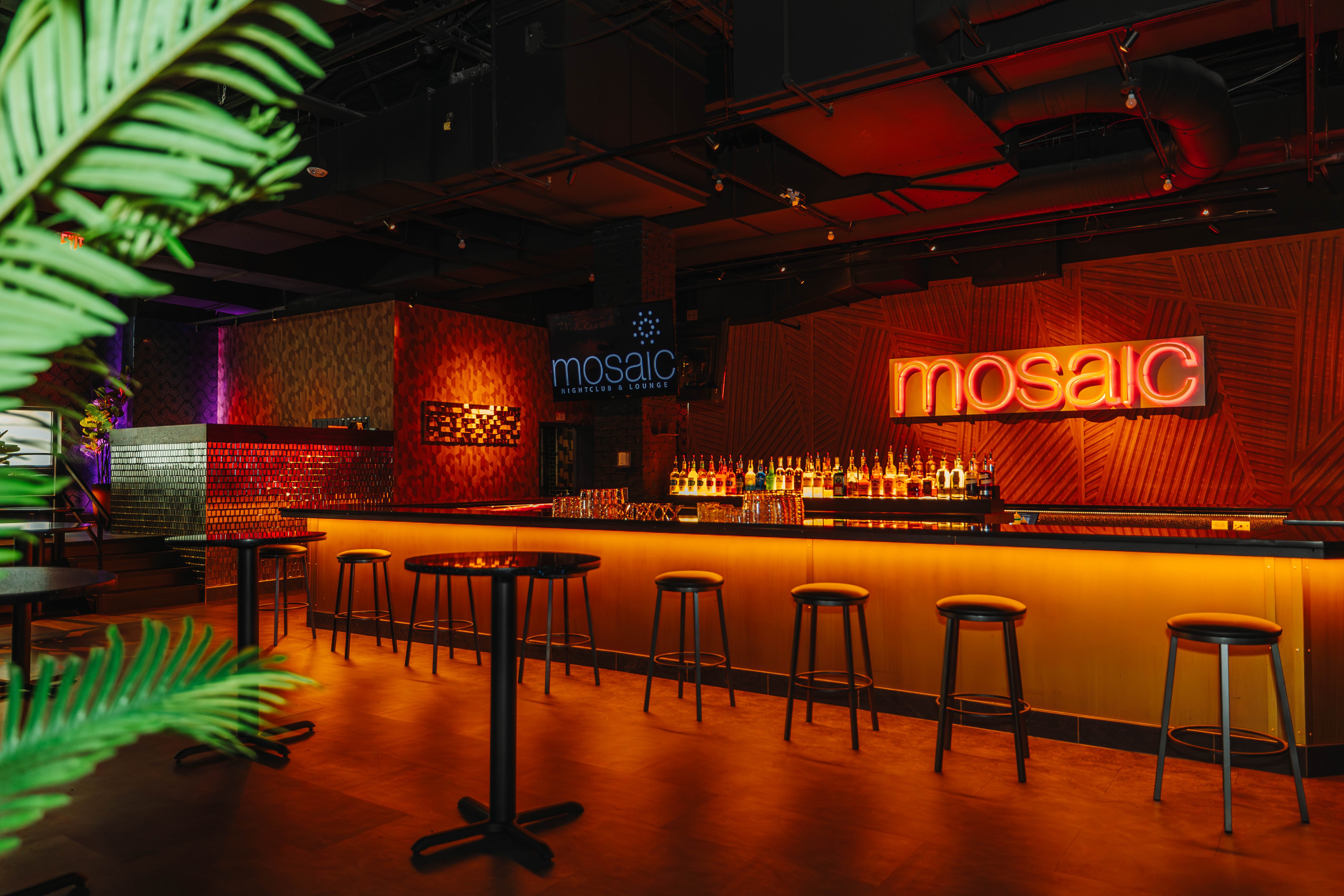 Mosaic's luxury cocktail lounge with warm ambient lighting