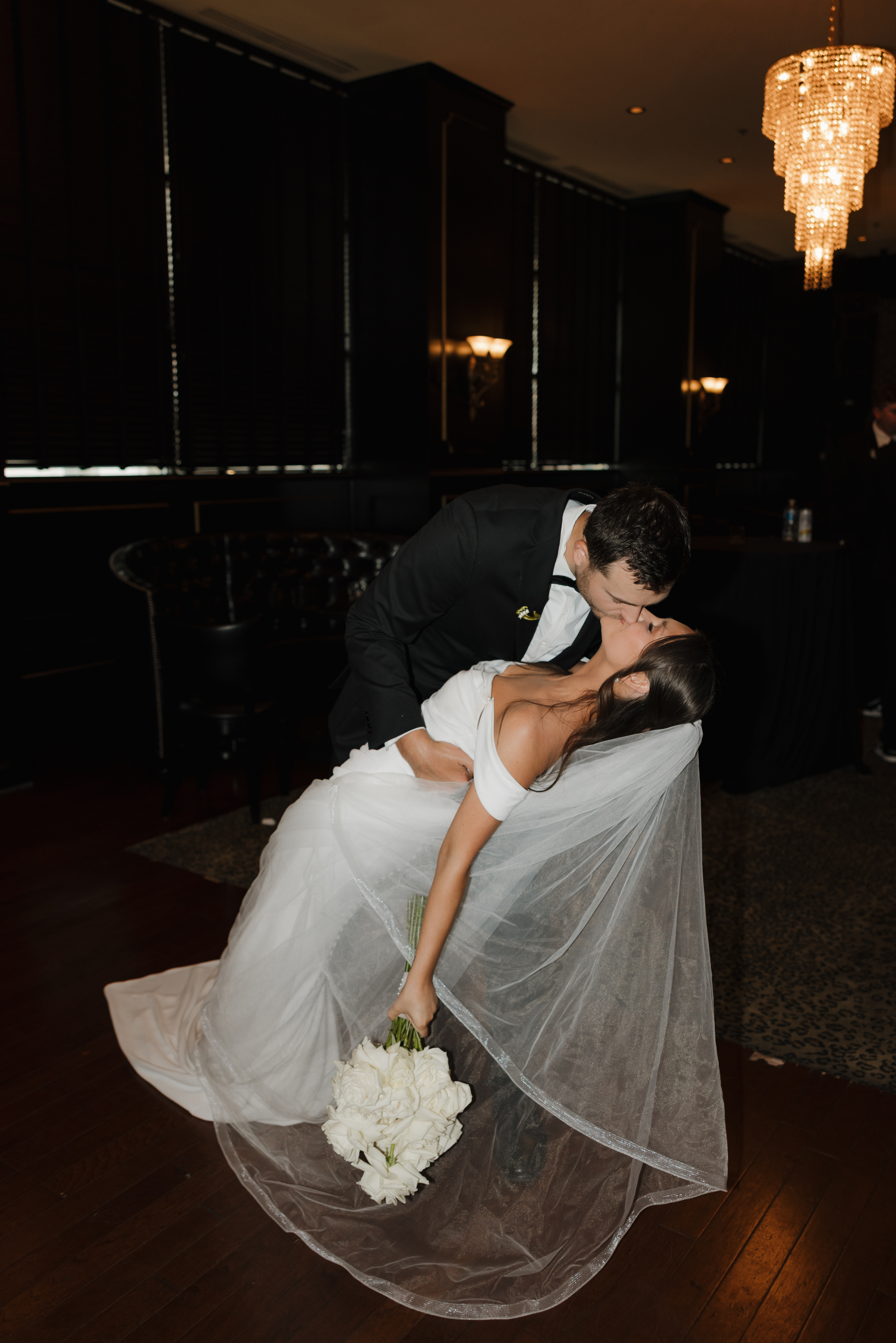 A couple share a kiss inside KDC.