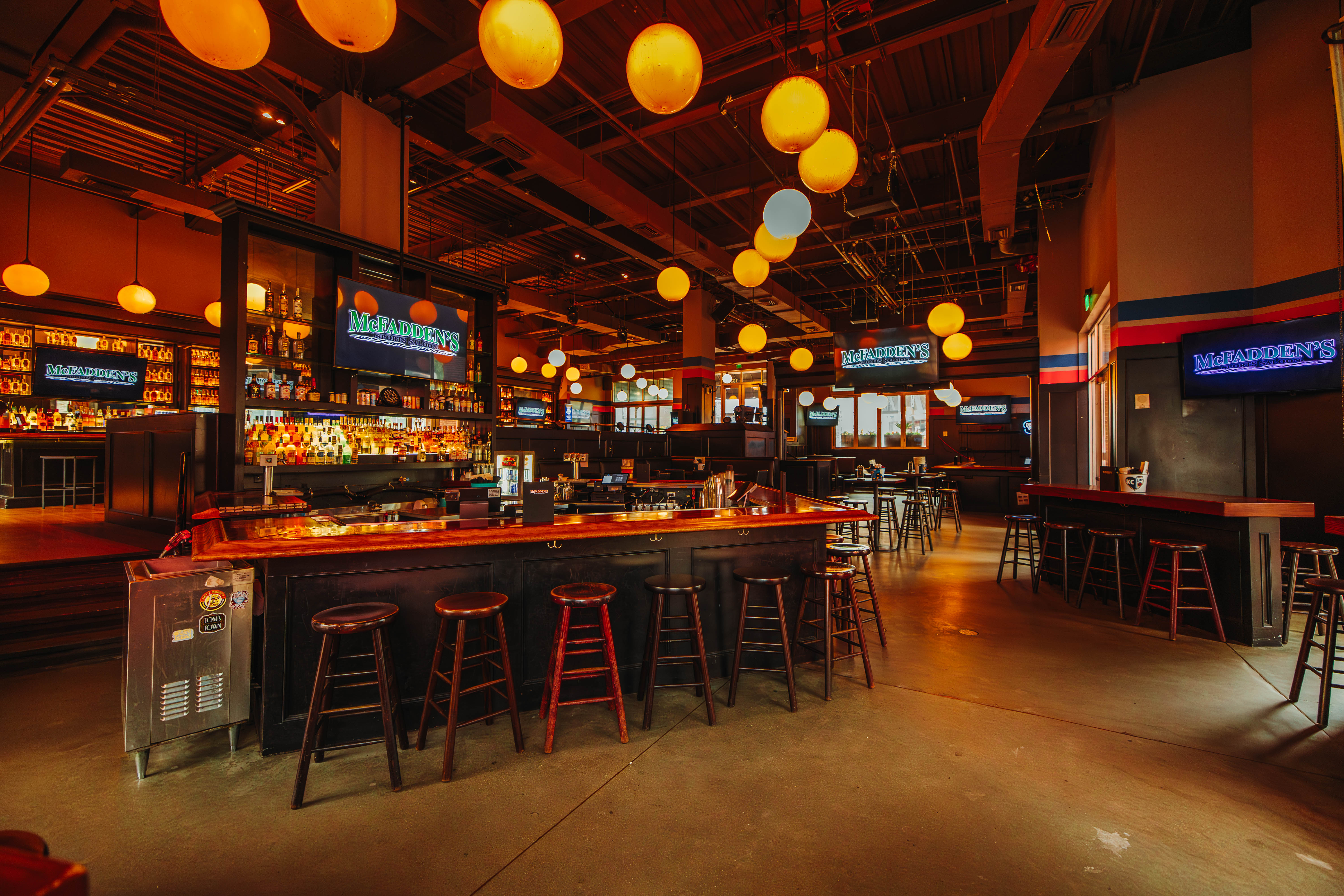 HD TVs and bar seating at McFadden's.