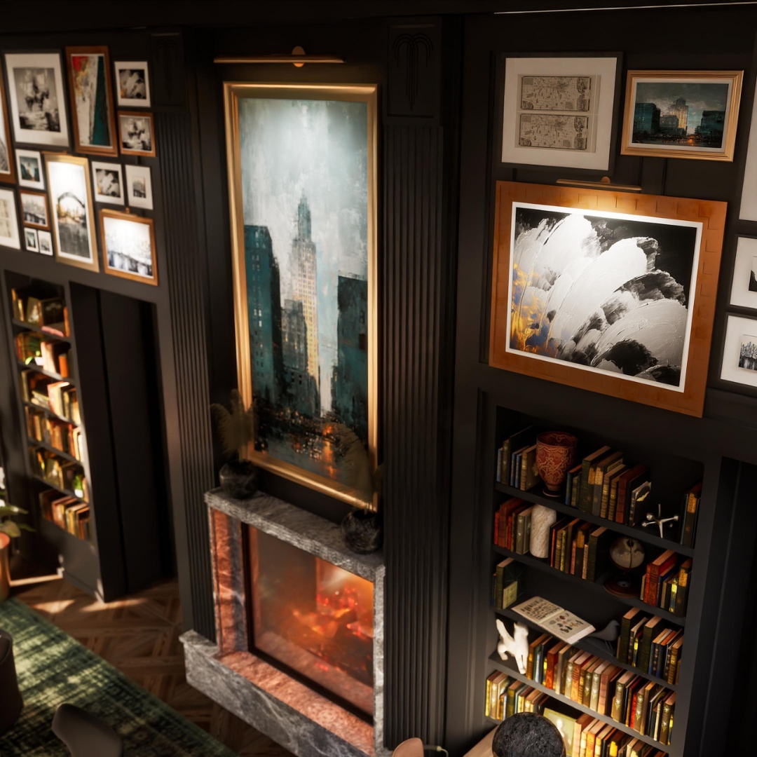 Several paintings hung on a wall above a fireplace at The Residence.