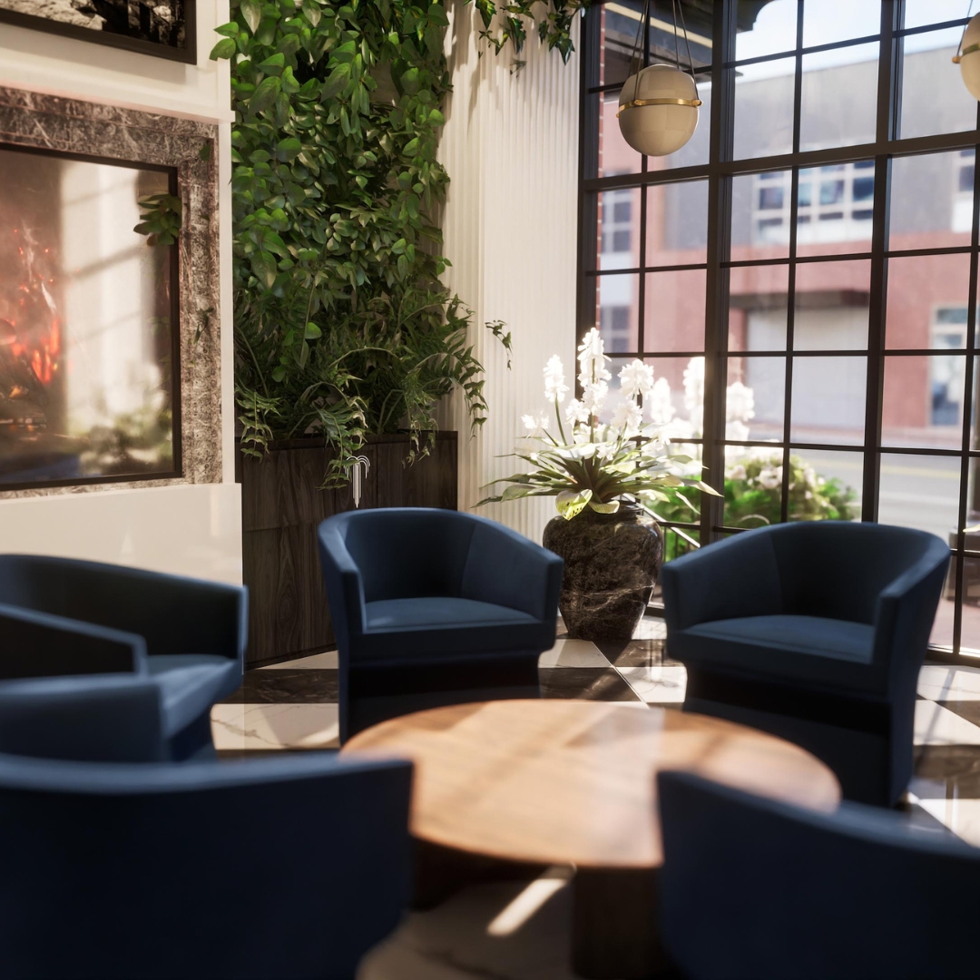 Blue lounge chairs and floor to ceiling windows at The Residence.