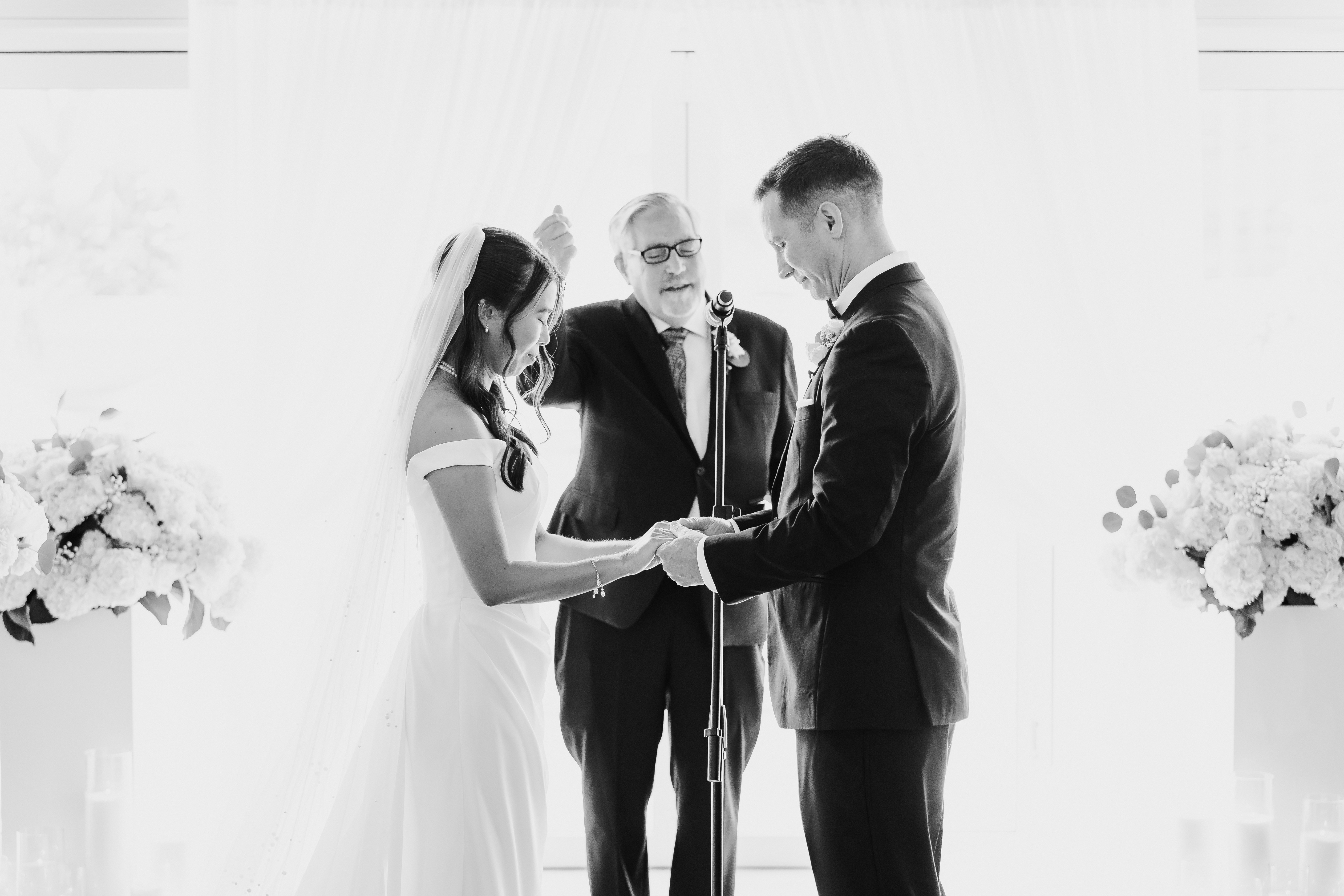 A bride and groom give their vows at The Gallery. 