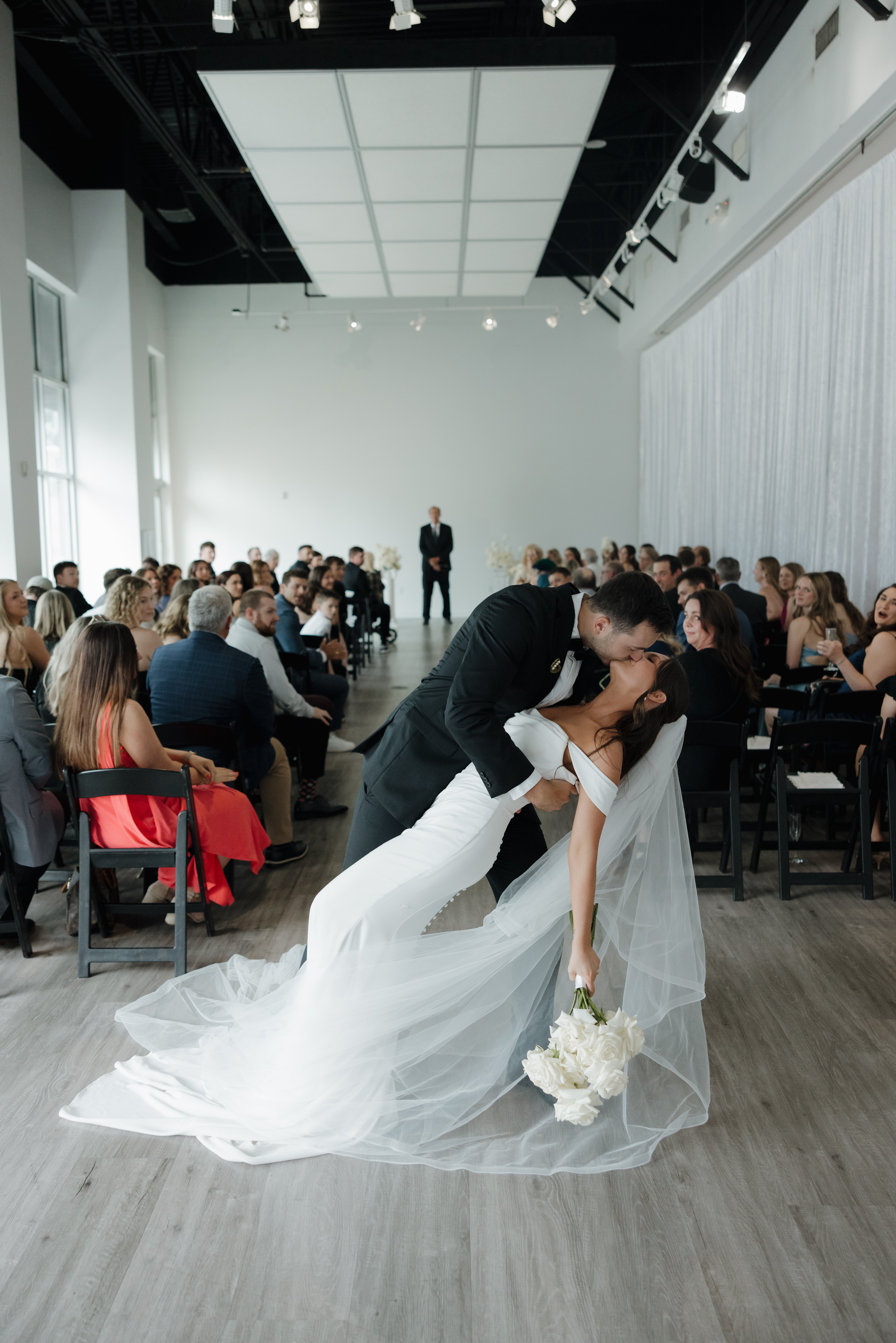 An intimate wedding taking place inside The Gallery.