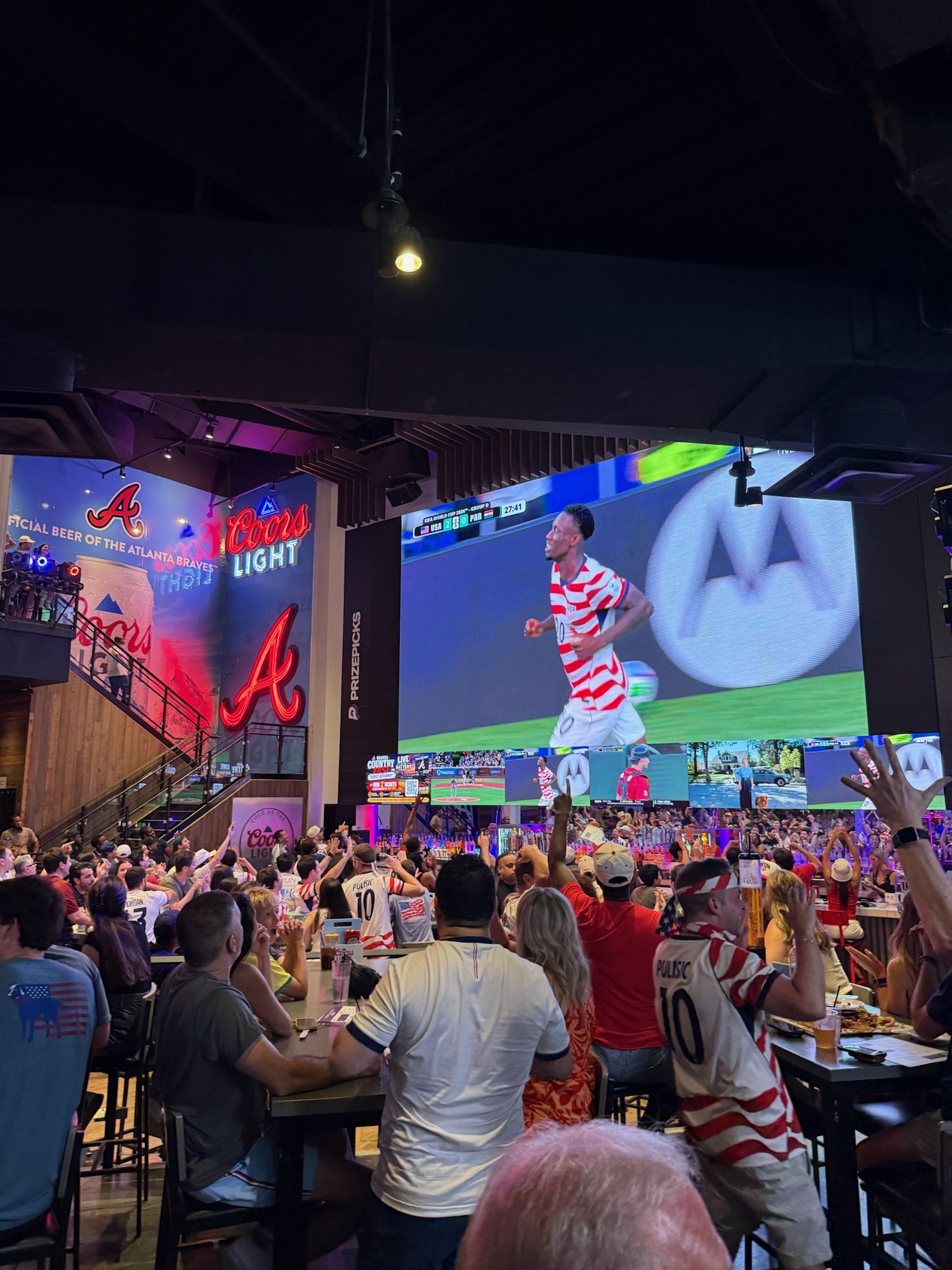 Fans enjoying watching International Soccer at Live! at the Battery