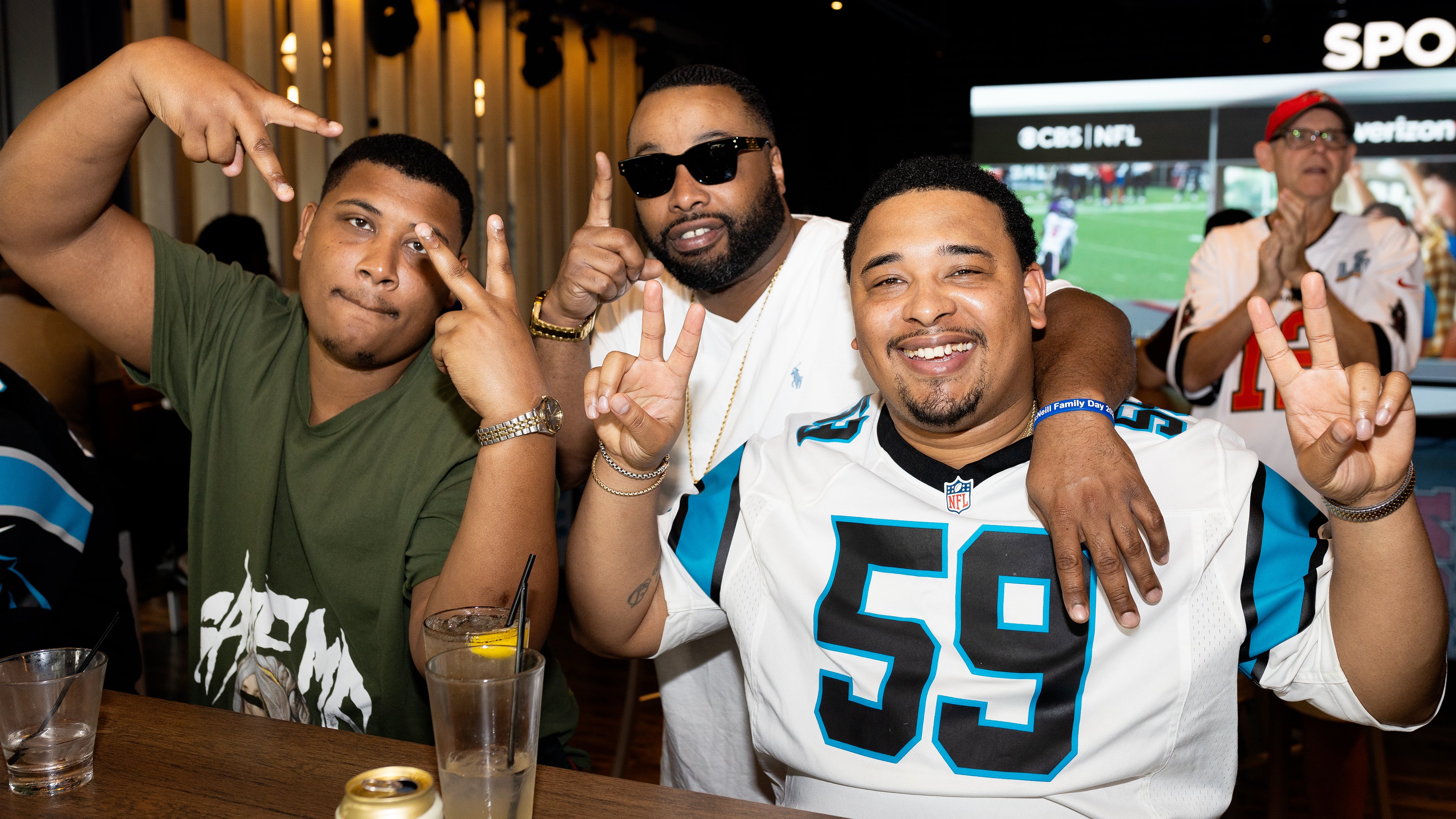 group of guys at a football watch party