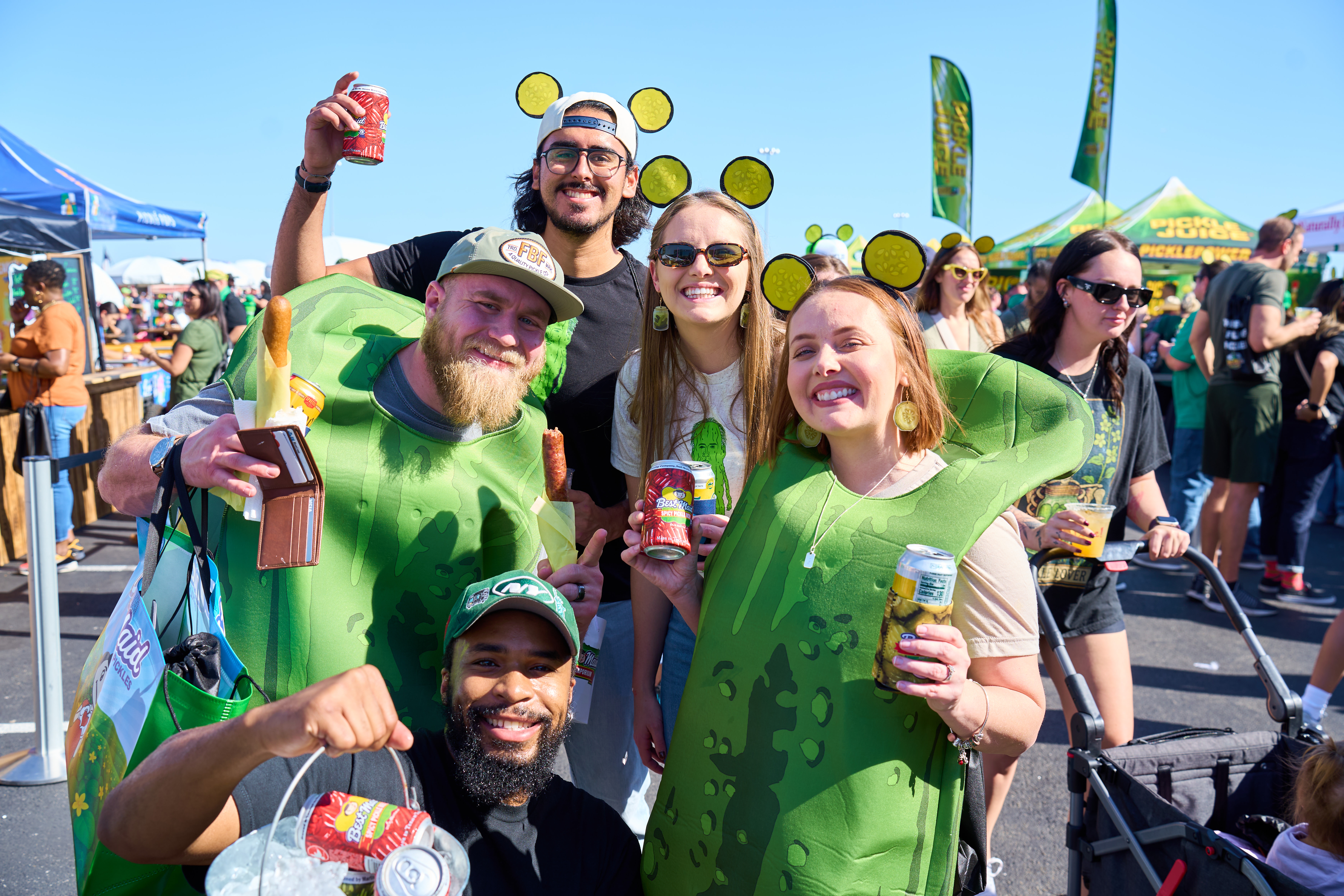 Group of people dressed up as pickles