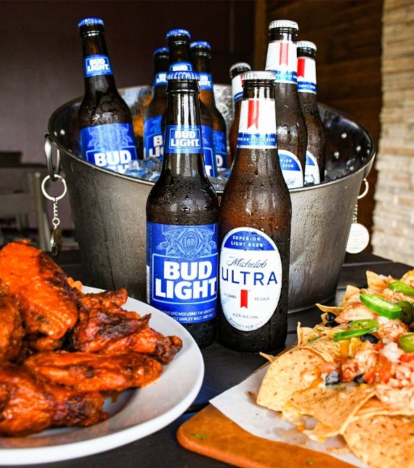 Michelob beer bucket, wings, and nachos fantasy football draft food package.