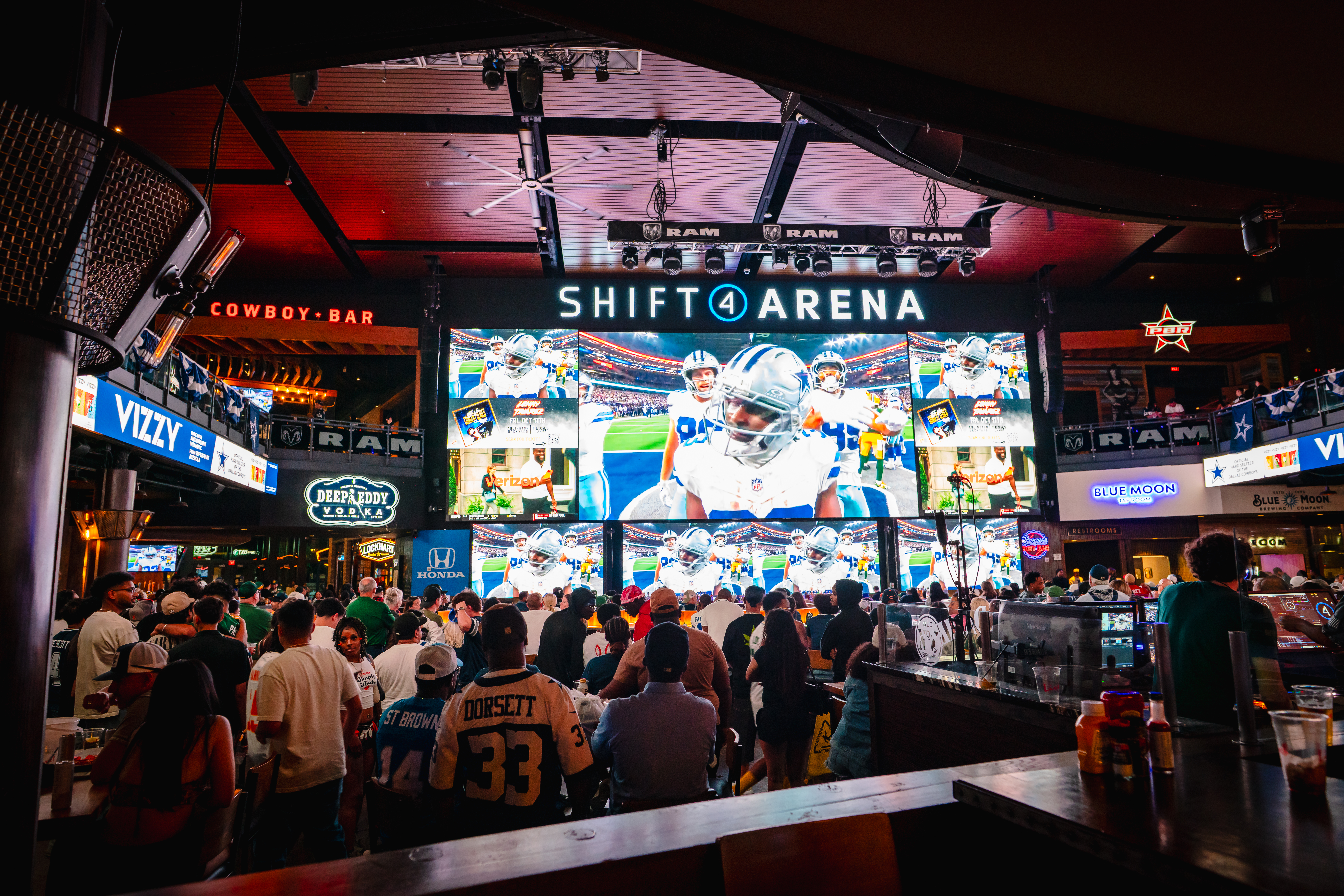 Dallas football playing on the 100ft screen in Texas Live