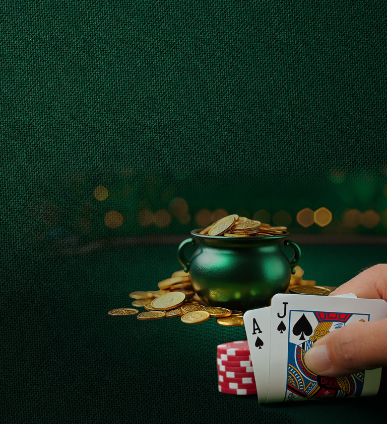 green background with shamrock pot and playing cards
