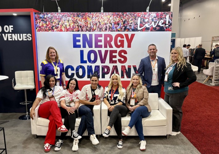 Live! sales employees at trade show.