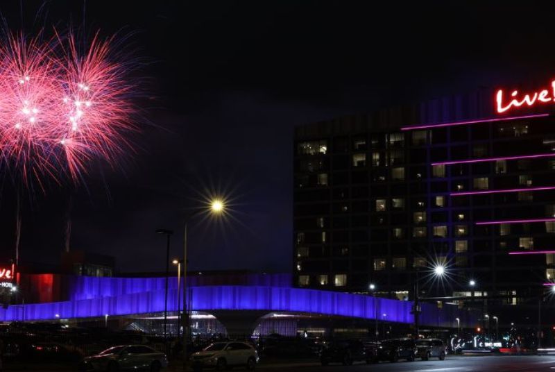 Cascading pink fireworks light up the night sky over Live! Casino & Hotel!