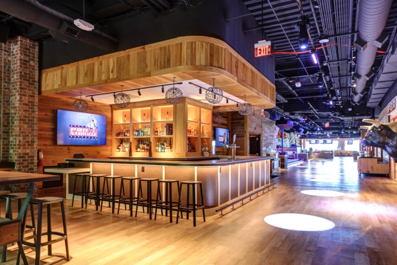 Bar and dining space at PBR Cowboy Bar in Nashville Live!