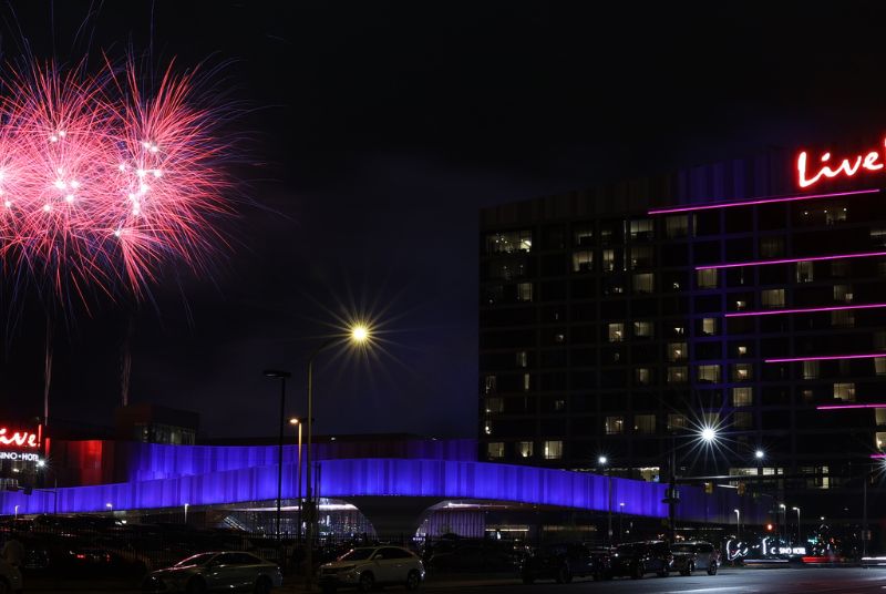 Cascading pink fireworks light up the night sky over Live! Casino & Hotel!