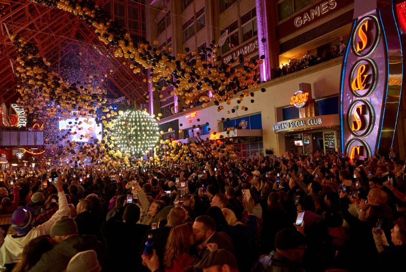 The ball and the balloons have dropped as bundled up revelers celebrate the new year's arrival!