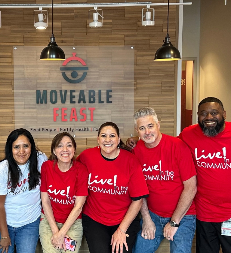 Live! in the Community event at Moveable Feast.  Live employees posing for a photo